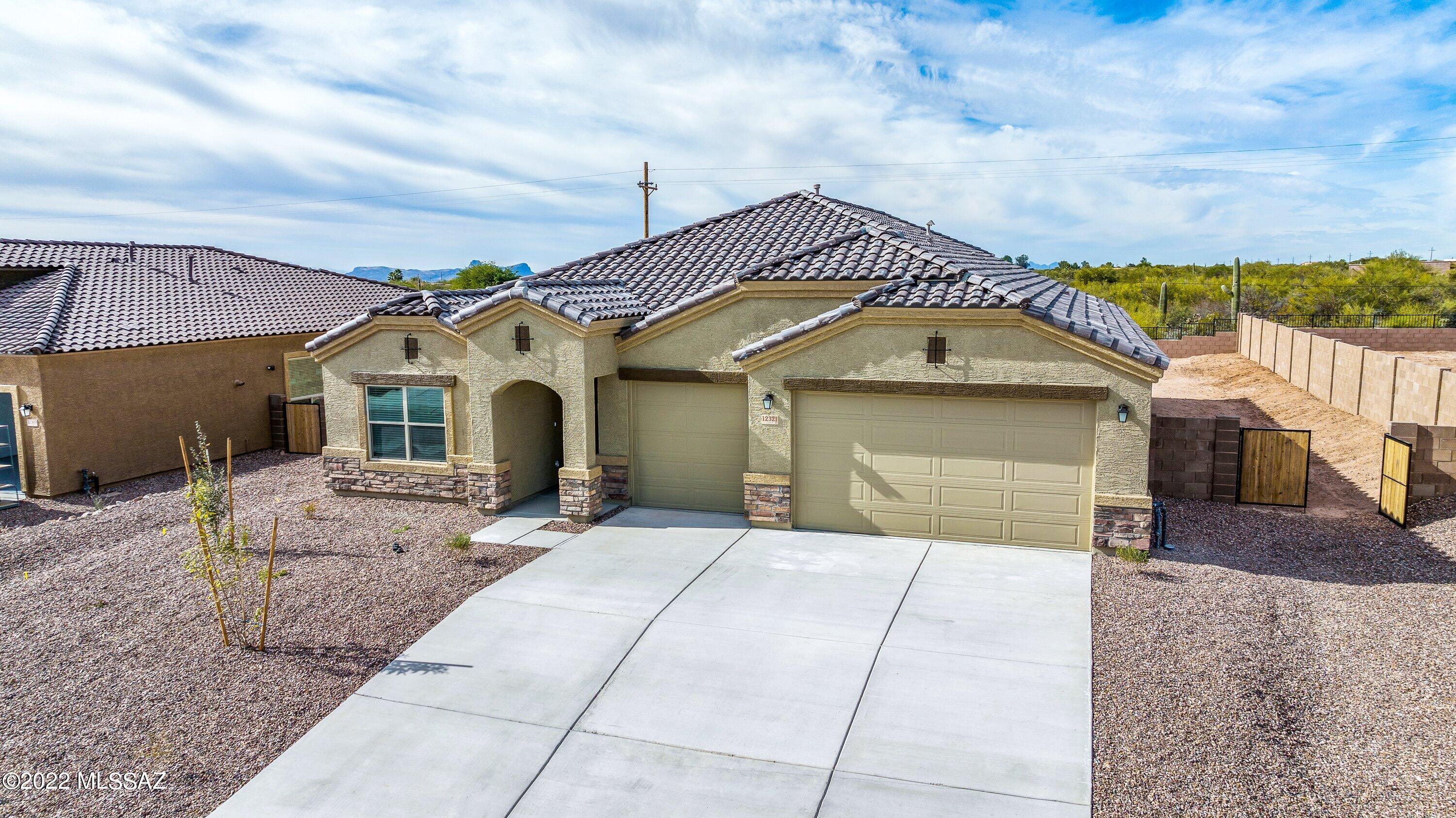 BRAND NEW CONSTRUCTION HOME IMMEDIATE MOVE-IN!! You will enjoy the natural setting and prime location,and many more options. Enjoy the evenings in this stunning backyard. This one story 2,486 sq. ft. ONYX floor plan features fabulous DESIGN CENTER FINISHES with an open Great Room area, 4 bedroom and 3 bathrooms, 3 Car Garage INCLUDES: 8' Exterior Doors, , all rooms prewired for TV and Ceiling fans, Patio Prewire, and 8' gate. Your Gourmet Kitchen comes complete with 42'' Flat Panel Cabinets, Separate Gas Cooktop with Built-In Oven and Microwave, Kitchen Island, and Ceramic Tile throughout. Brand new community close to shopping and entertainment. This beautiful home is tucked away with stunning Mountain Views.