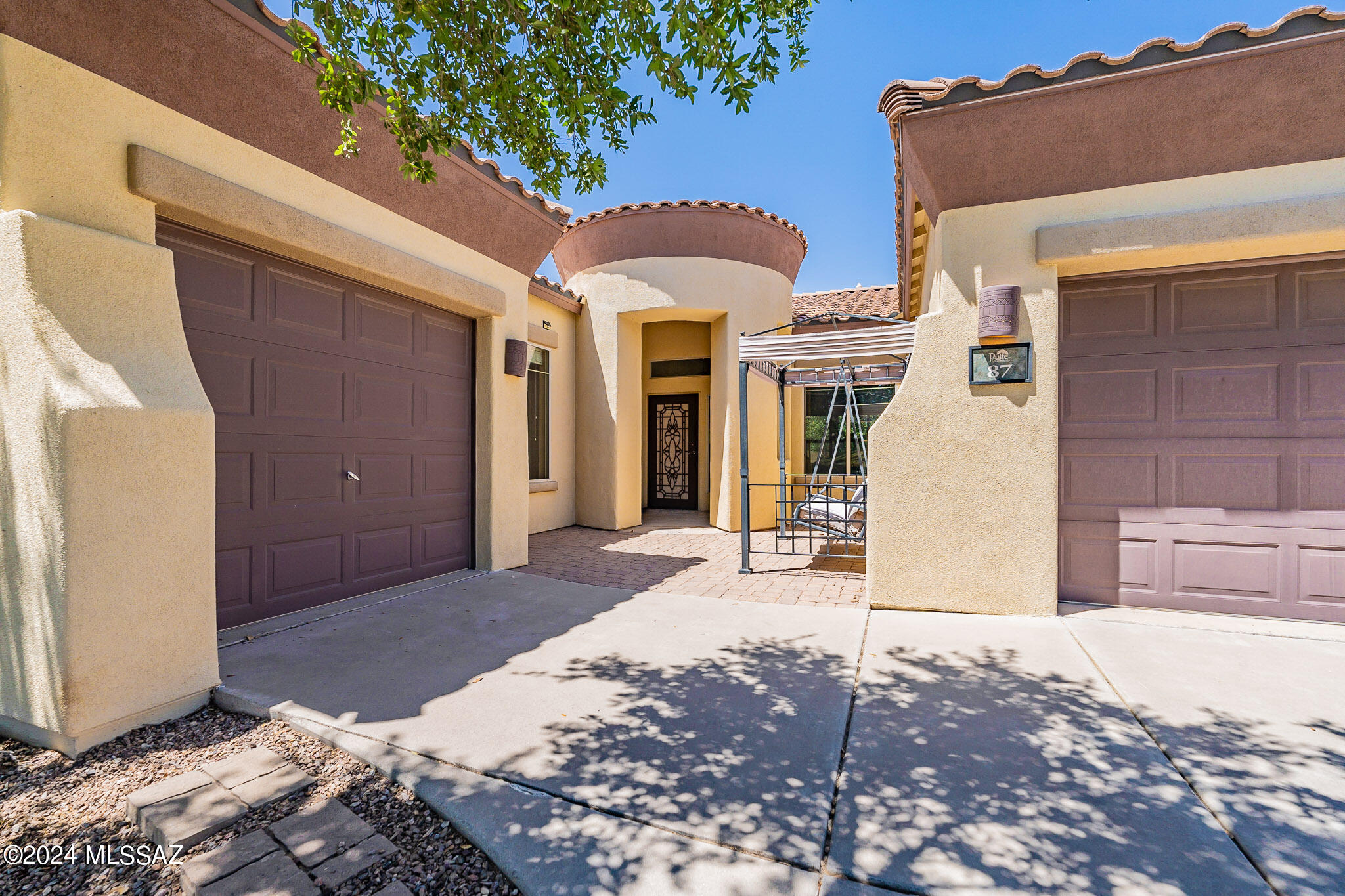 .You're sure to find what you are looking for in this beautiful Rancho Sahuarita property!  Take advantage of neighborhood amenities such as a sparkling lake, community center complex, pools, playgrounds, and walking paths. This well-maintained 3 bed/2 bath home has a three-car garage, north/south exposure, and is on a corner lot. Enjoy the large kitchen, generous open living space, and split floor plan, as well as the convenience of tile throughout.