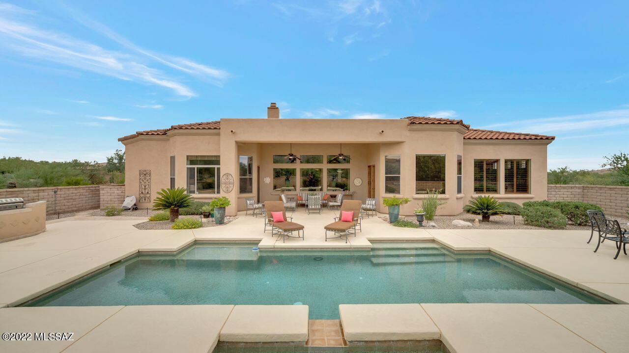 SELLER MOTIVATED !!!  ONE ACRE OF TRADITIONAL ELEGANCE IN GATED DOS LAGOS- Enter crtyd w/ bubbler fountain & seating.  Foyer w/ inset tile, gas FP, raised hearth & VIEWS! Hardwood floors, shutters & porcelain tile thru-out. Open kitchen & family room offering Asko DW, Dacor 5 burner gas cooktop, Sub Zero fridge, Kitchen Aid wall ovens, pantry closet, island, breakfast bar, family dining area. Double door entry to secluded primary suite, w/ bay area seating, patio access, dual closets, lg linen closet, soaking tub, roomy glass shower. Bedrooms 2 & 3 each have en suite baths, den/office w/ closet. Laundry w/ cabs & counters. Expansive covered patio to enjoy the mountain views! Beautiful pool & spa w/ water feature, fire pit & blt in BBQ. 3 car garage. Original owner ! Call for private showi