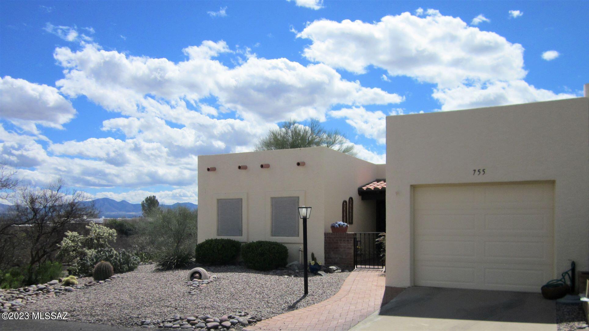 Presenting a wonderful townhome in a fabulous setting in a lovely location, Continental Vistas.  It is situated on a cul-de-sac, an end unit, so there is nice privacy and quiet, and extra parking space!  But WAIT!  The back yard is a glorious setting for the spectacular mountain views, from Green Valley to Tucson, which you can see from the screened AZ room,  living and dining rooms--ALL DAY LONG!  Inside, the home is lovely and pristine, with great taste throughout. Floors are all tile, except carpet in primary BR. All windows have been replaced, and in Living Room they were expanded to draw in all the beautiful mountain views! And it comes furnished; the furnishings are very nice.  This is a not-to-miss, one-of-a-kind home with an extraordinary setting calling your name! Call me to see!