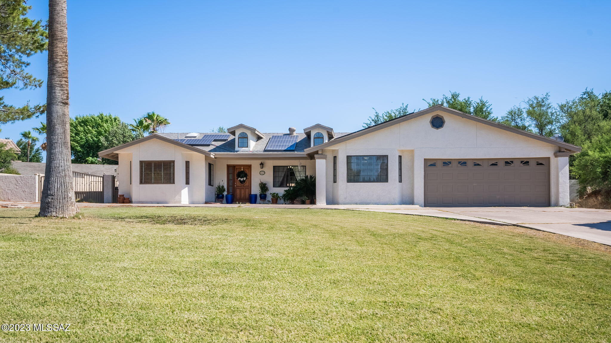 Located in the desirable Meadow Hills subdivision of Nogales, AZ., this stunning 4-bedroom, 2-bathroom home showcases the owner's pride and offers a comfortable and inviting living space. Situated on a large lot, this home boasts an abundance of natural light that fills every corner. Step inside to discover a cozy fireplace in the spacious living area. The recently renovated master bathroom adds a touch of luxury, featuring modern fixtures and finishes.

The heart of the home lies in the spacious kitchen, which has been thoughtfully upgraded with granite countertops and ample storage space. Cooking and entertaining will be a breeze in this well-appointed culinary haven. plenty of room for a growing family or those who love to entertain guests. Schedule your showing today.