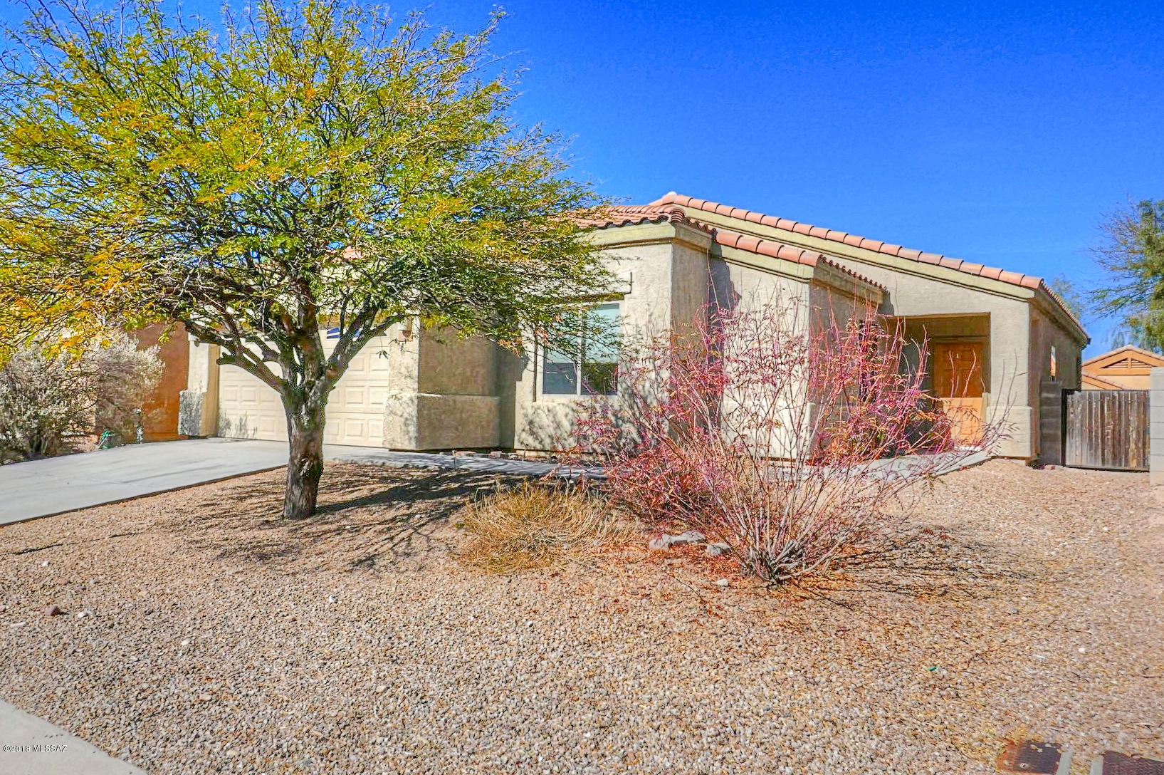 This home is Range priced from $189,500-199,500. Seller will accept or counter offers in this range. RARE single story 4 Bdrm 2 Bath home in gated Vista Montana Estates. Large kitchen with maple cabinets, corian counter-tops & spacious pantry opens to a HUGE great room. Security system installed. Huge walk-in closet in master bedroom and another normal closet. Ceiling fans and carpet in bedrooms, the rest of the house is tiled. Community center includes pool, spa, clubhouse, playground, basketball court & picnic ramadas. Growing neighborhood minutes away from Vail schools, DMAFB, Raytheon, U of A & Downtown.