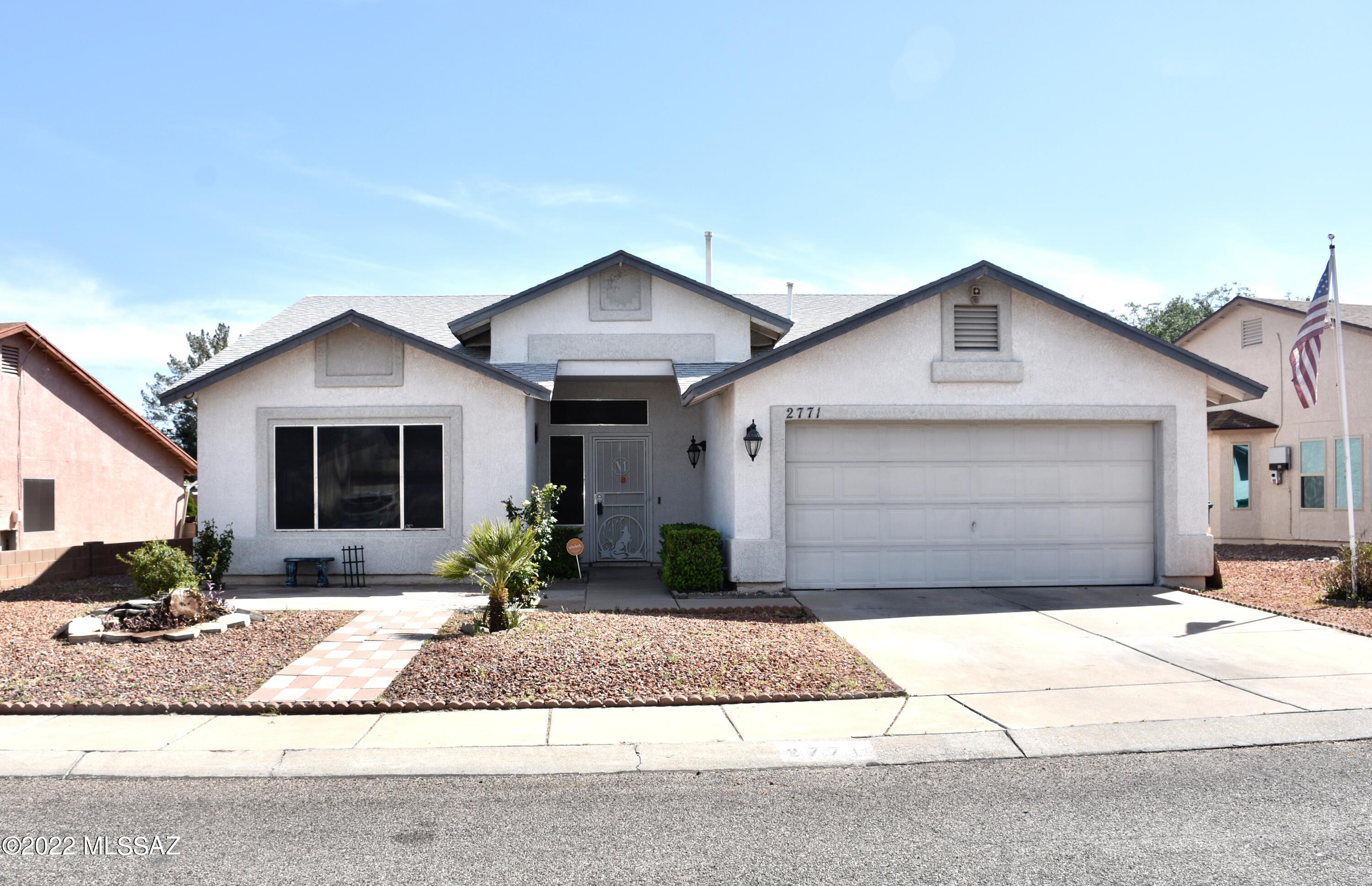 Fantastic 4 bed 2 bath  single story home that has been well taken care of.  This home is almost 1900 square feet and new carpet has just been put in.  The carpet is in bedrooms and living room. Tile every where else. Enjoy the full length covered patio and 2 car garage. This home has a nice open floor plan and a nice fireplace in the family room. This home is close to everything you need including restaurants, shopping, schools and a park.  Easy access to I-19 and I-10.