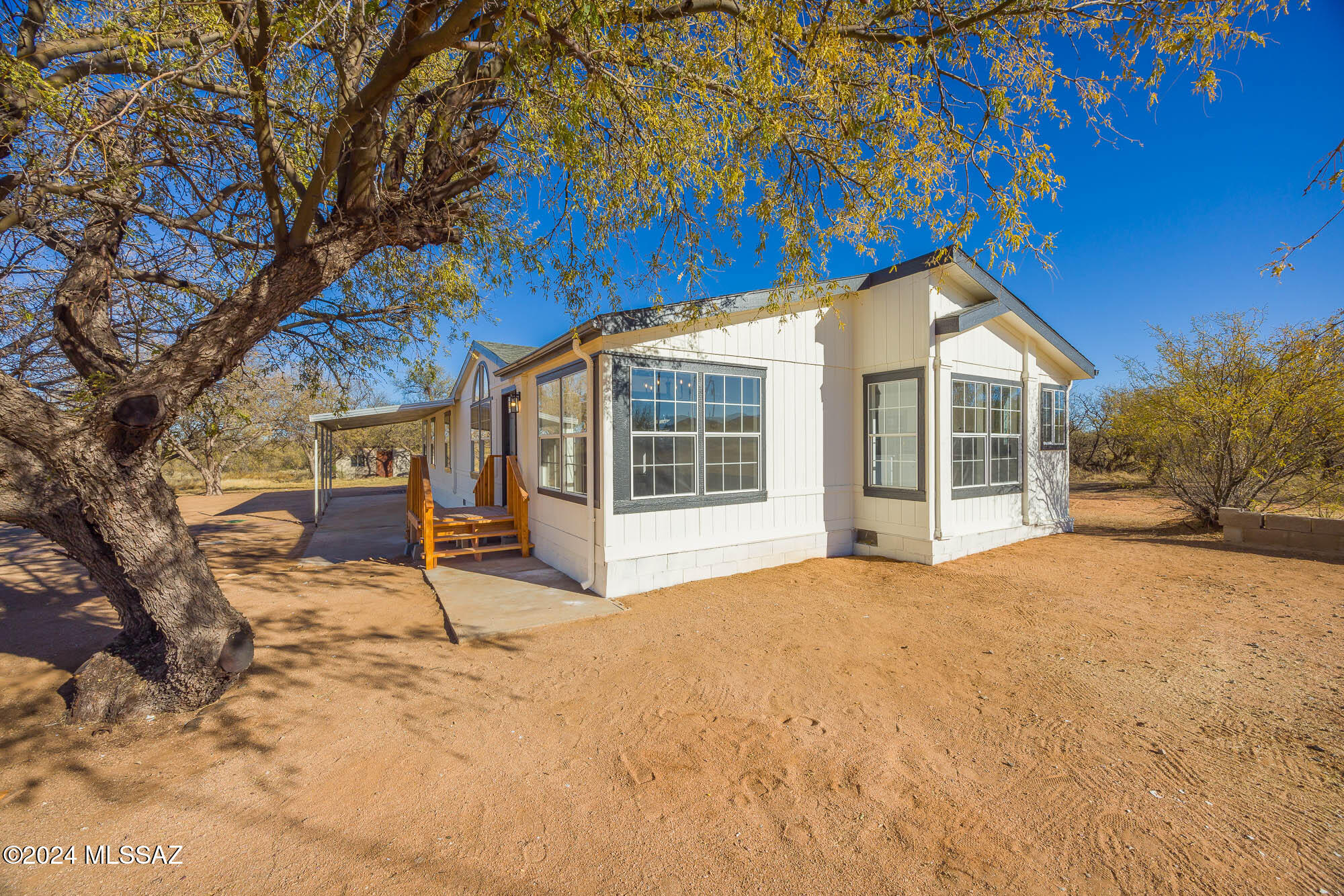 Welcome to this beautifully remodeled 3-bedroom, 2-bathroom manufactured home nestled on over 9 acres of serene countryside. Recently updated from top to bottom, this home boasts a brand-new roof and HVAC system for peace of mind and year-round comfort. All-new flooring throughout, adding modern elegance to every room. Enjoy breathtaking mountain views from your expansive property, offering endless possibilities for outdoor activities, gardening, or creating your own private retreat. Whether you're looking for tranquility, space to grow, or a move-in-ready home with thoughtful upgrades, this property has it all.