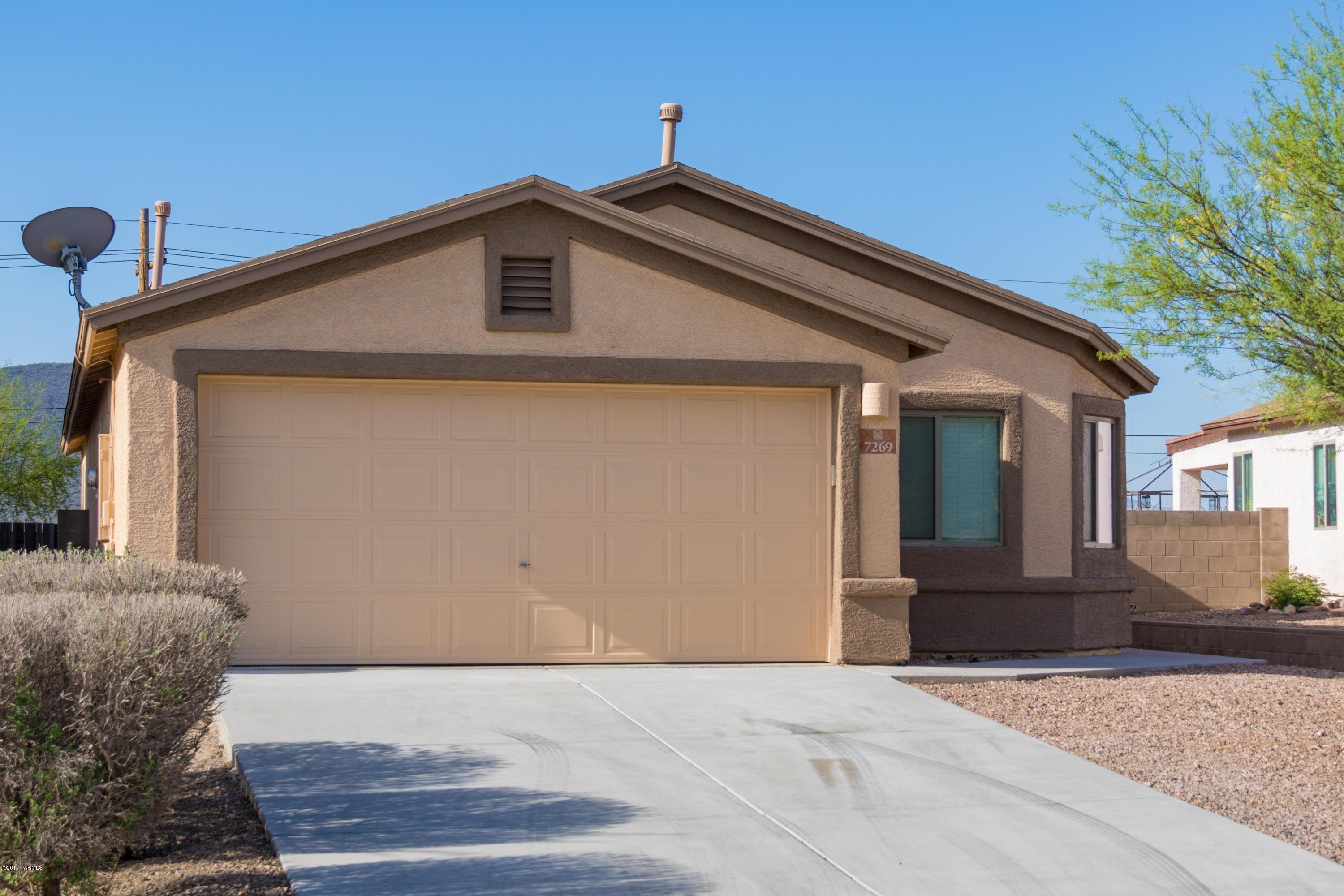 Beautiful Tucson's west side home Available. This home has a popular open floor-plan. EXTERIOR WAS PAINTED 4/10/2017!!  Enter into your large great-room with easy care updated tile floors, custom paint and lots of natural light. The gourmet kitchen is just off the great-room and includes all appliances, gas stove, dishwasher, built-in microwave, granite counters and pantry. The home offers a split floor-plan providing lots of privacy for your master suite. The master bath has double sinks, walk-in shower and garden tub. All other bedrooms are spacious w/ generous closet space. Your beautiful private backyard has unobstructed mountain views, artificial grass and fully finished pavers.