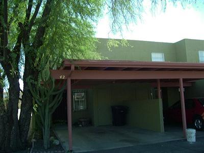 Very nice Townhouse near Tucson Mall. Very clean. Two bedrooms upstairs. One car carport. Small rear patio.  Located at rear of Complex for peace and quiet.