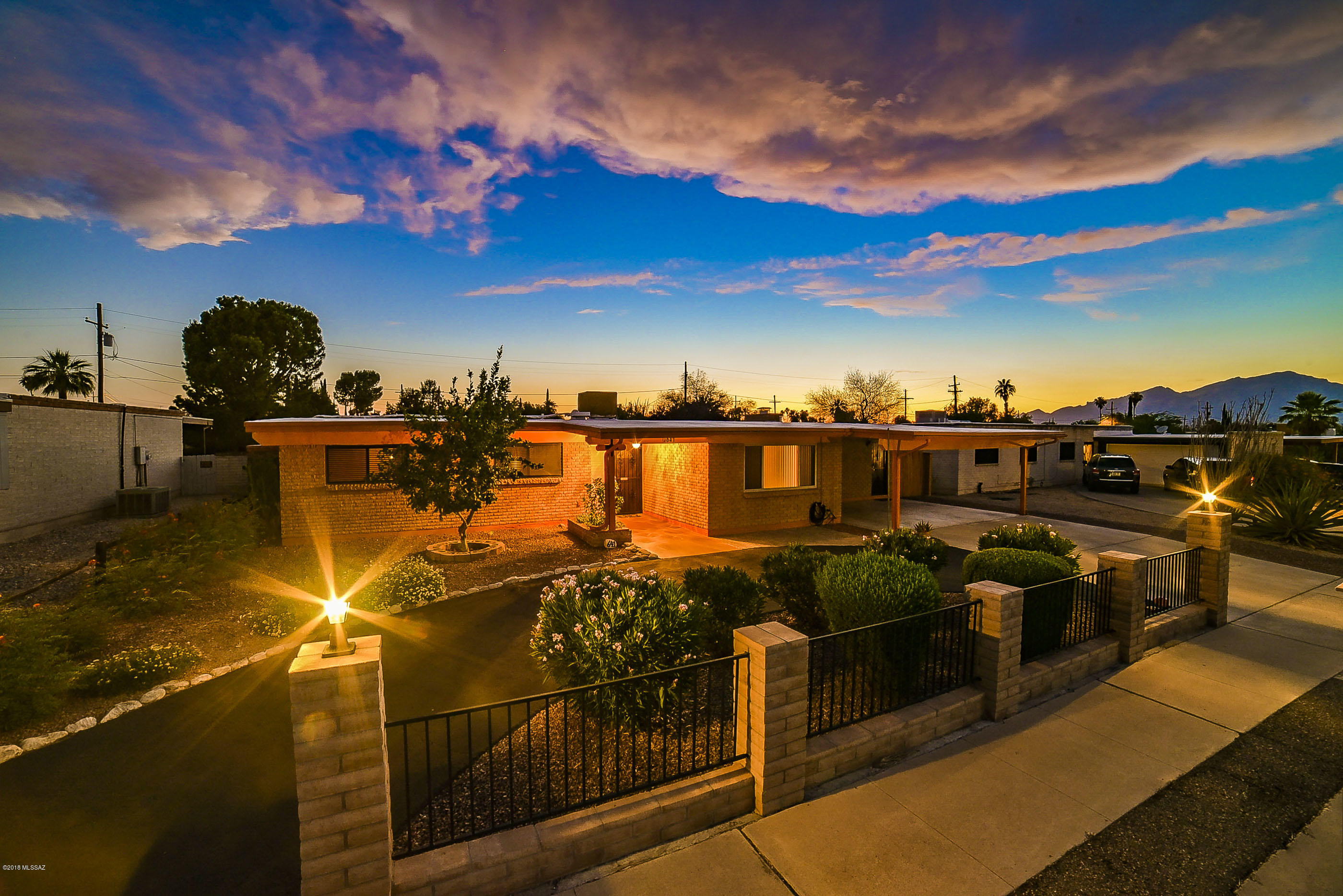 Welcome to a stunning 4BR, 2BA home with 2070 sq.ft. in  wonderful Eastern Hills. 2017 roof, laminate wood and ceramic tile throughout except the upgraded carpet in the living rm. Both baths have been updated with exquisite marble counters, lovely vanities, mirrors, light fixtures, and tile. The 2017 kitchen refrigerator with ice maker  is hooked up to the Reverse Osmosis system. Beautiful knotty hickory cabinets in the ''mud room,'' with freezer and second refrigerator that stay. 10 ceiling fans inside & 1  outside in the covered brick patio. Beautifully landscaped front & back yards - back features a Pebble Tech pool, mature vegetation, green grass, fountain, an outdoor shower, utility sink, 2 storage sheds & water softener. All windows are dual pane; back ones have security shutters.