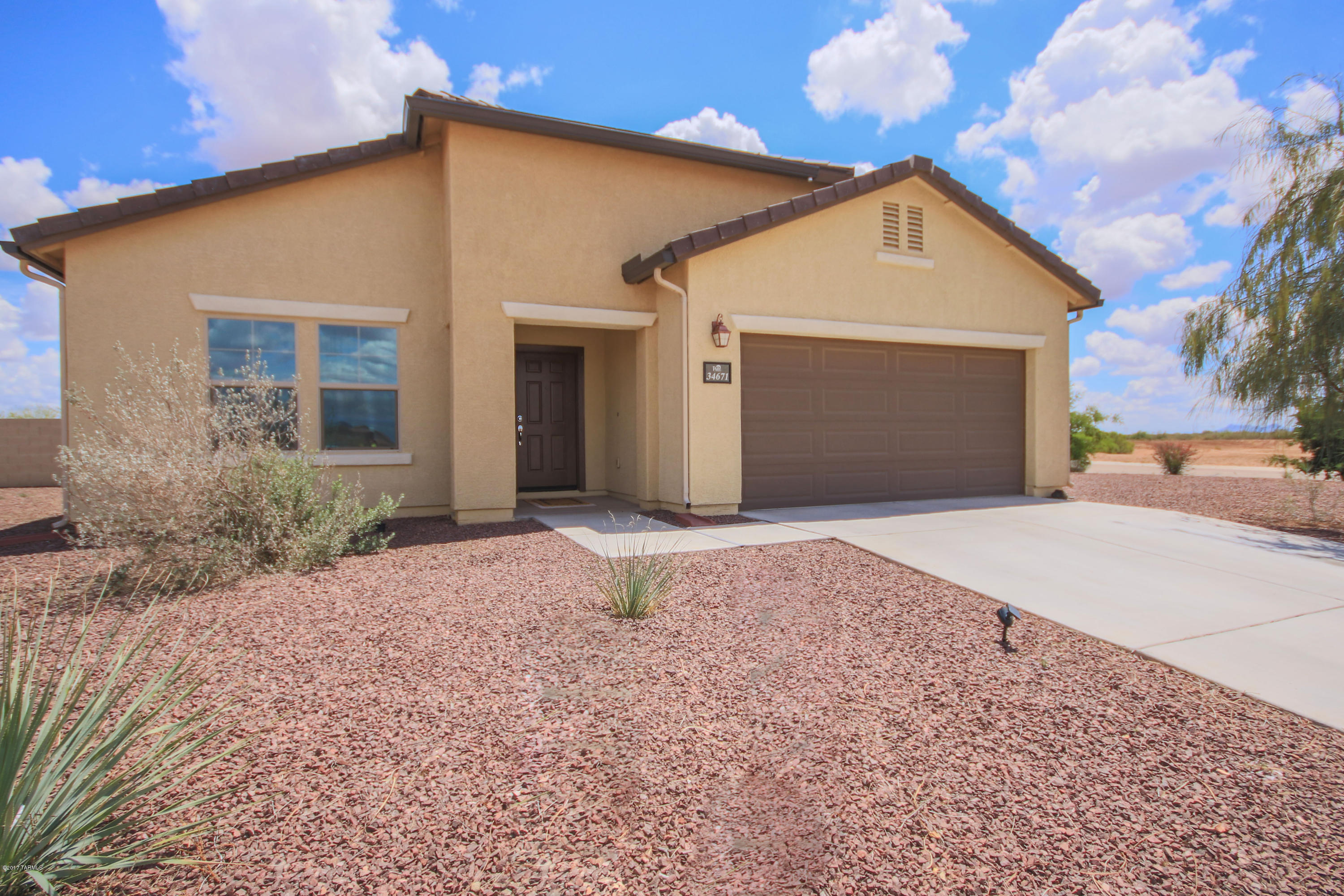 Stunning home with lots of upgrades including a large open kitchen with extended center island, beautiful granite counters, upgraded 42'' upper cabinets, ALL appliances, upgraded flooring throughout, executive height vanities in bathrooms, separate den/office with doors, vaulted ceilings, ceiling fans, and so much more! The exterior feature a sparkling pool with low care backyard, no rear neighbors, and all on a corner lot! Community also features a beautiful pool, water slides, park, and so much more. Come see your practically brand new home and call it yours!