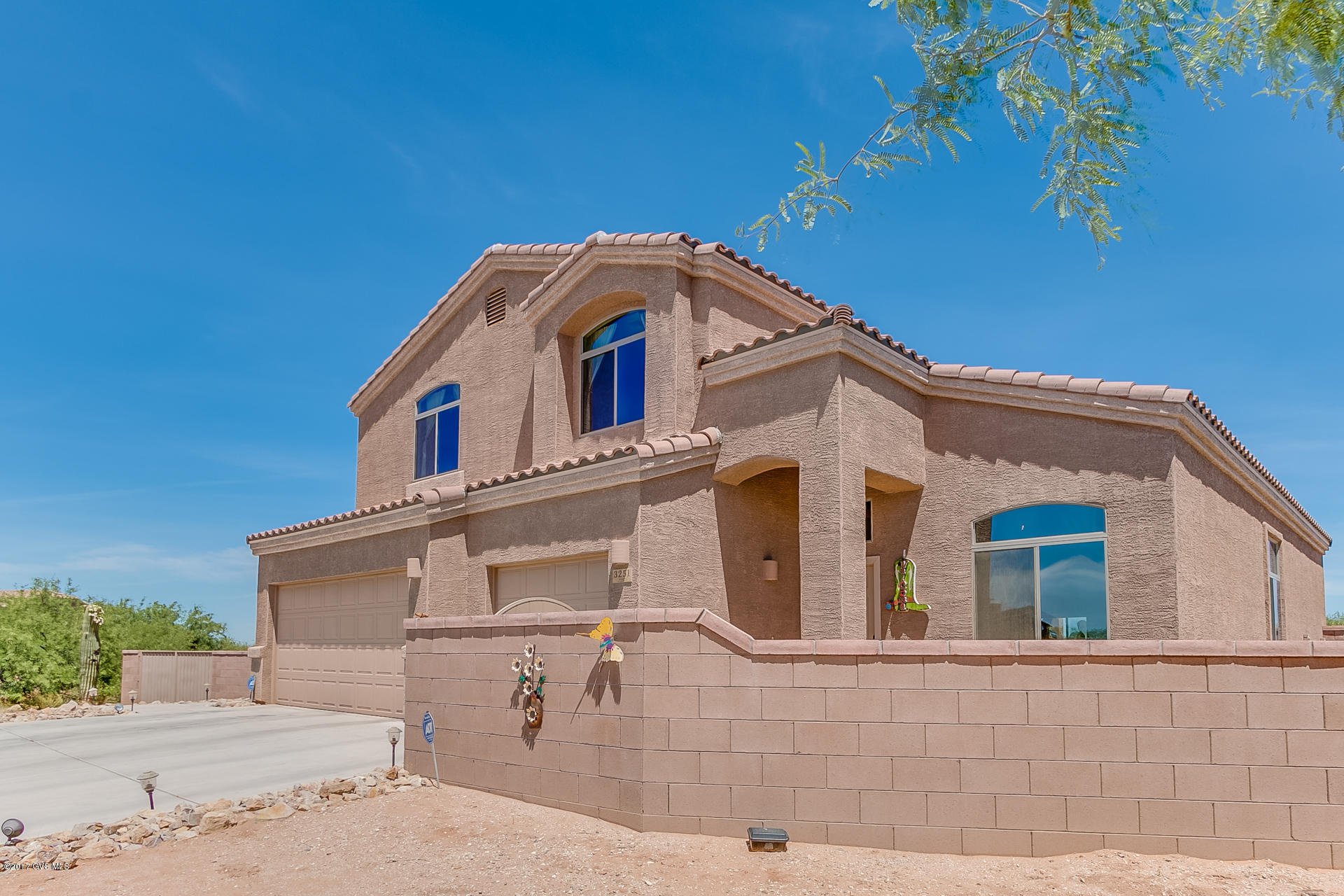 PANORAMIC MOUNTAIN VIEWS!!! ENORMOUS 1.49 ACRE LOT!!! This GORGEOUS home boasts MANY upgrades! Front courtyard entrance, open floor plan, HUGE great room/kitchen, breakfast bar/center island, formal living/dining, downstairs bedroom w/full bath, SOARING VAULTED CEILINGS, GRANITE counters in kitchen and baths, black kitchen appliances, maple cabinets, ceramic tile entire first floor, tile in all wet areas upstairs, wrought iron/wood stair railing, upstairs loft area, HUGE master suit w/French doors entrance, private balcony, master bath separate garden tub/shower, his/her sinks, blinds and ceiling fans, alarm, 3 car garage w/epoxy paint, 6ft+ walled in backyard/RV gate (HOA allows RV) extended patio, separate kids play yard w/playset, fire pit, tether ball, WIDE OPEN SPACES!!! MUST SEE!!!