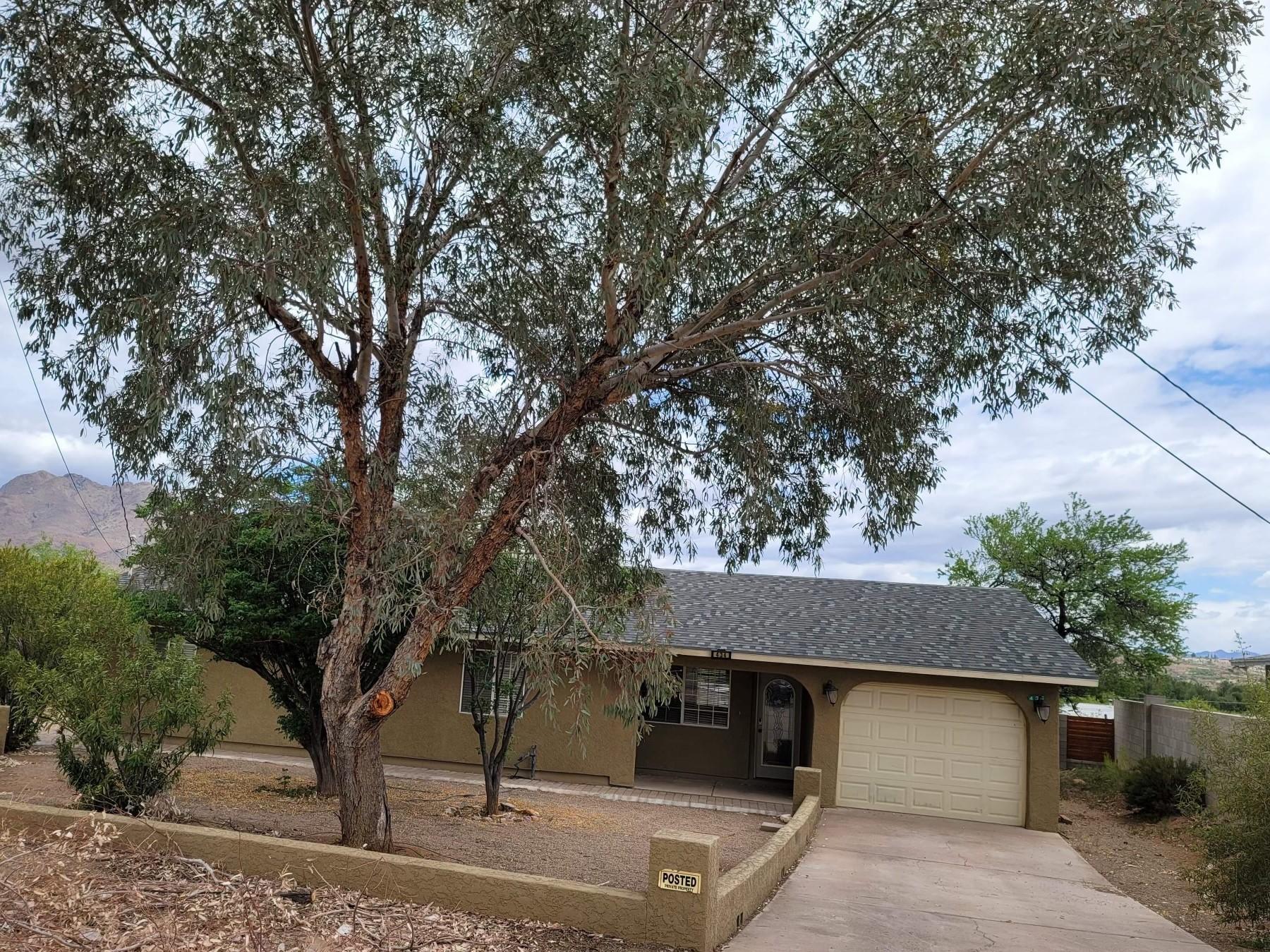 Recently remodeled home with large yard.   Centrally located in Rio Rico and easy access to the freeway.   Renovations included are granite countertops, kitchen cabinetry, new stainless steel appliances, flooring, interior painting and more.