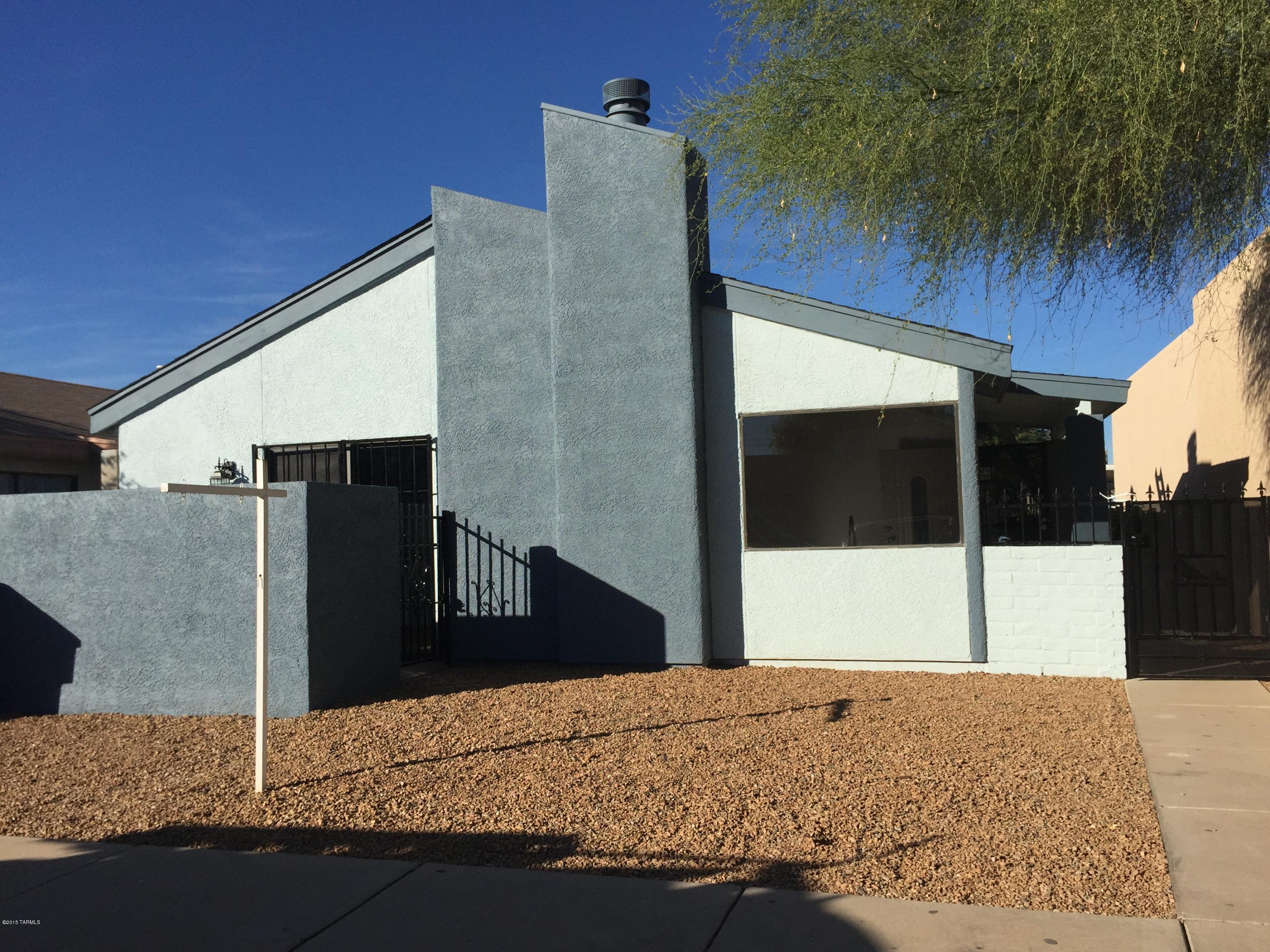 Remodeled 3BD/2BA Gem in South Tucson. Brand New Roof w/5 Year Warranty, Brand New Kitchen Complete w/SS Appliances, Brand New Evap Cooler, Water Heater, New Paint Inside and Out, Vaulted Ceilings, Skylights and More! Backyard Features Fruit Trees, Open Yard, Covered Carport and Wrought Iron Double Gate w/Alley Access For Your Larger Toys. HOA Fee Includes Community Pool. Within Walking Distance of Liberty Elementary School. Come See Today! Agent Related to Seller.
