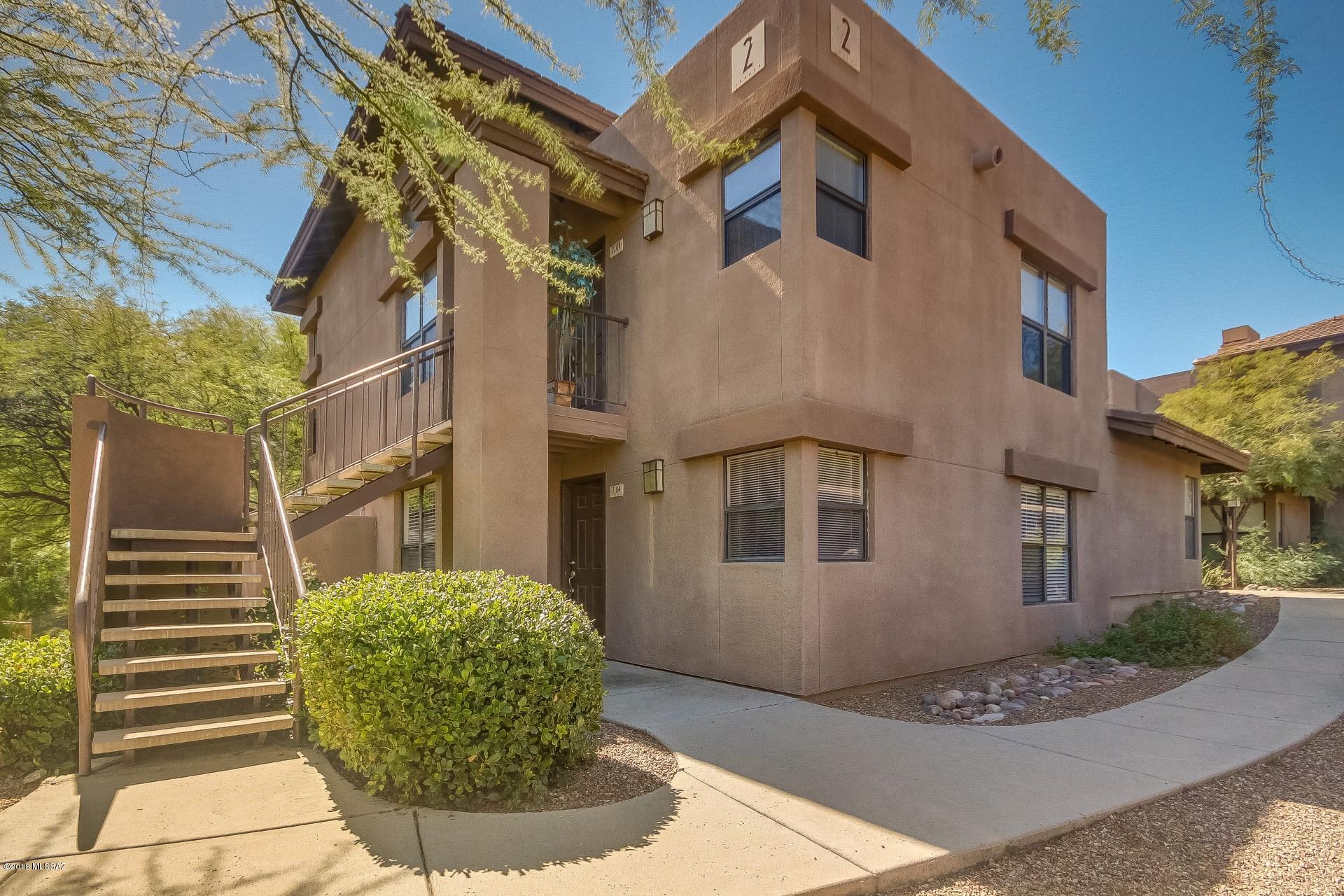 Fantastic Condo in the desirable Community of The Greens at Ventana Canyon. Spacious open floor plan features cozy fireplace, ceiling fans, window blinds, and neutral palette throughout. French door to private balcony with tee box views. Stylish kitchen counters, black appliances, tile floor, pantry, and plenty of wood cabinets. Generous size bedrooms and ample closets. Master retreat offers walk-in closet and private en suite. Interior laundry closet with washer/dryer included. This wonderful unit is move-in ready. Motivated Sellers! SUBMIT ALL OFFERS!