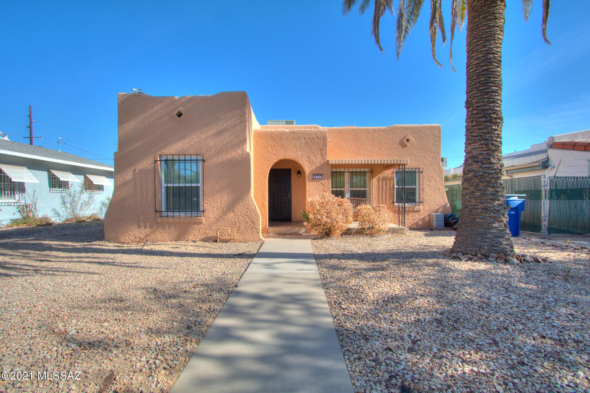 This 1933 constructed Tucson bungalow radiates thoughtful upgrades and improvements both inside and out bringing this classic home into the modern era. The kitchen boasts new granite countertops, new backsplash, and new appliances. Bathrooms have new vanities, fixtures, and flooring. Entire interior has been freshly painted. The Improvements to the function of the home include: all new windows and new plumbing run from the house to the street.  The roof has been recently recoated. With its proximity to U of A, shopping, dining, and public transportation makes it a great family home or income property. The work has been done and this home is ready to enjoy!
