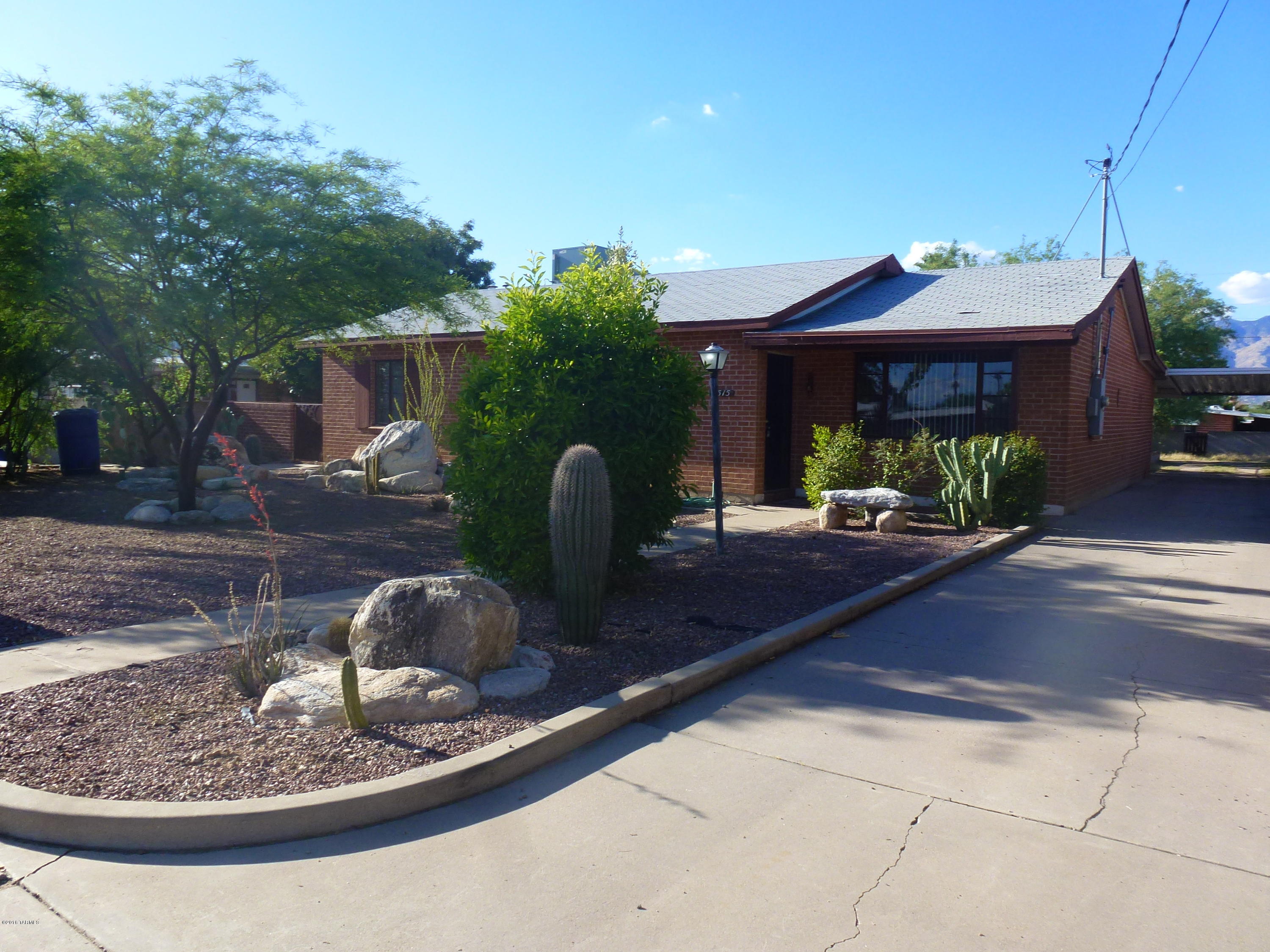 Very spacious 3 bdrm./2 bath completely tiled. Large living room, separate family room with fireplace. Laundry room with extra storage space. Lots of parking and a single detached garage.