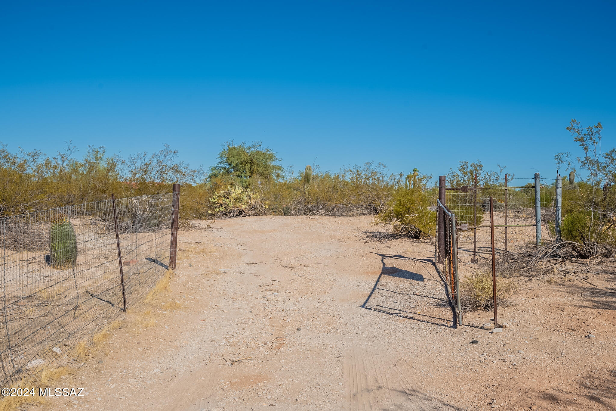 Discover the perfect blend of tranquility and accessibility with this sprawling 9.97-acre parcel, with opportunity to split available. Nestled in a breathtaking desert landscape, this property offers panoramic views of the majestic Catalina Mountains. The property is fully fenced in with access from both Orange Grove Road and Montabella Road.

The property features a registered well, ensuring a reliable water source and convenient storage for all your tools, equipment, or recreational gear.