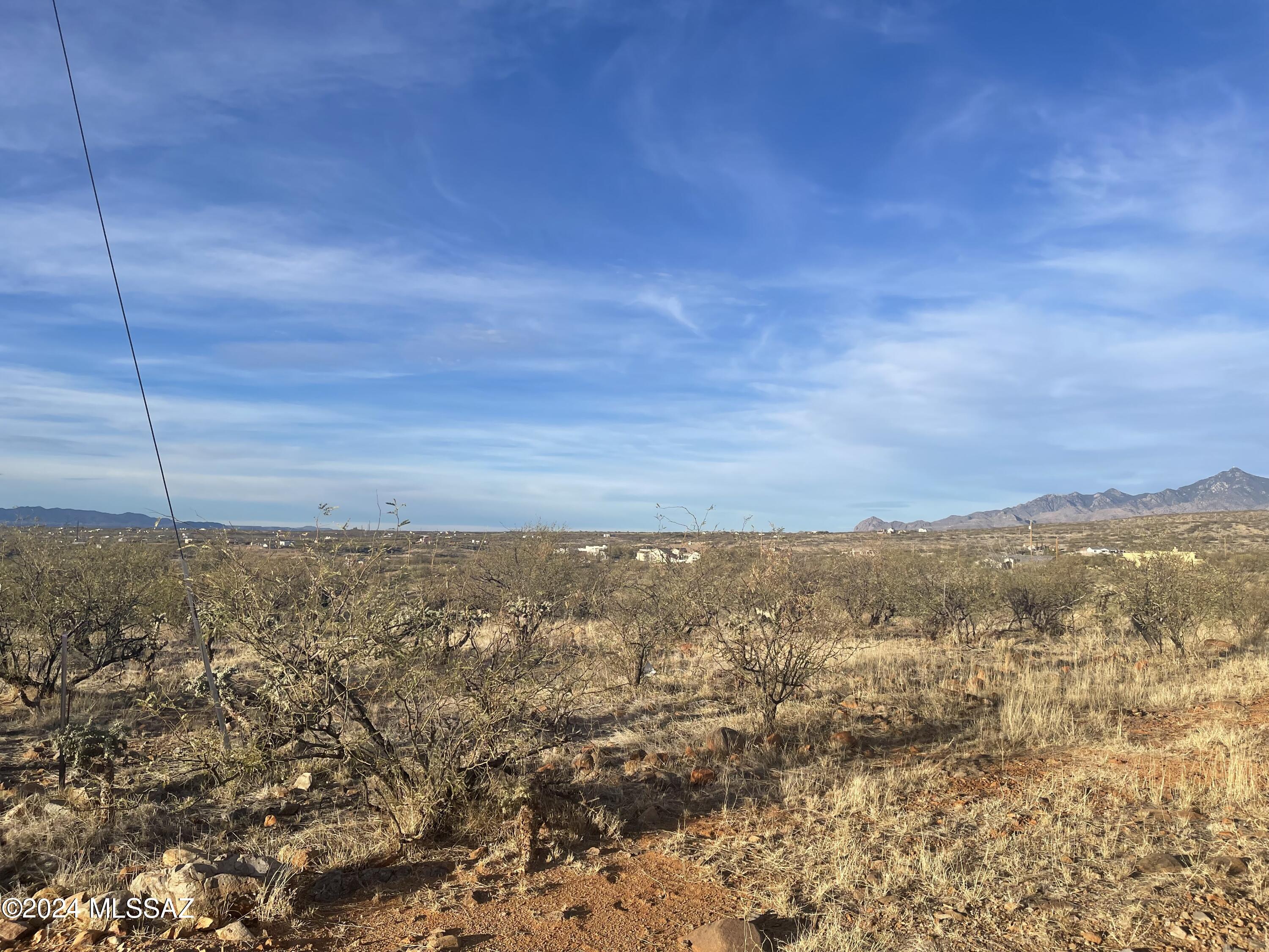 Two parcels are being sold together to make a 2.26-acre parcel (98,546 sq .ft)
********(Parcel 132-01-183 and 132-01-184.)
Build your dream home here and enjoy the beautiful views of the nearby mountain ranges.  Flat building site with utilities nearby.  Close to the interstate, shopping, and restaurants.