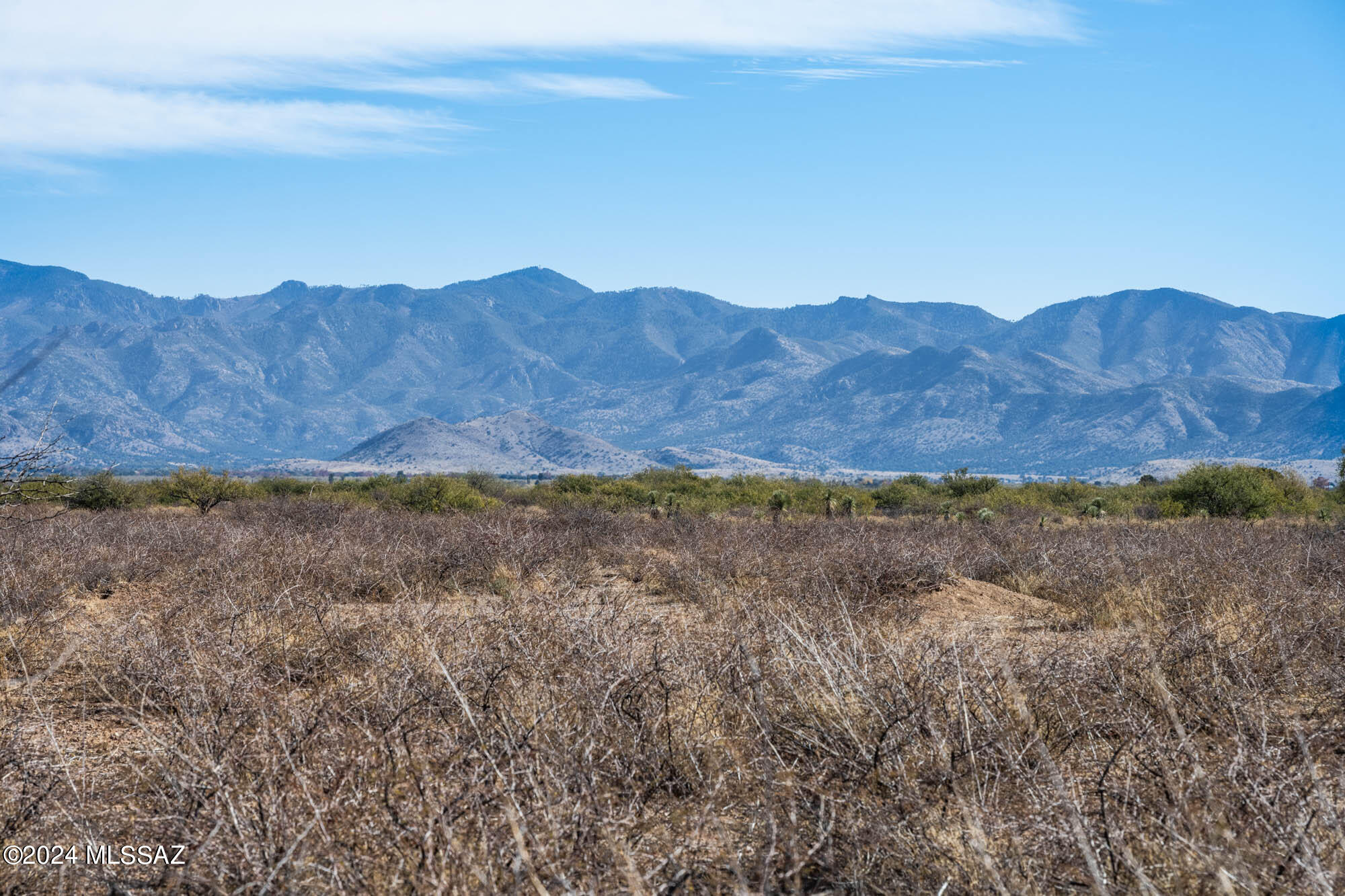 Incredible views from this 5.03 acre flat buildable RU-4 lot. Watch the sun rise over the Chiricahua Mountains and set over the Dragoon Mountains. Bring your horses, chickens and other livestock. Start your off-grid dream. Seller will finance with$2900 down plus buyer's escrow fees. Monthly payment approximately $232.00 a month with all fees. Don't miss out.