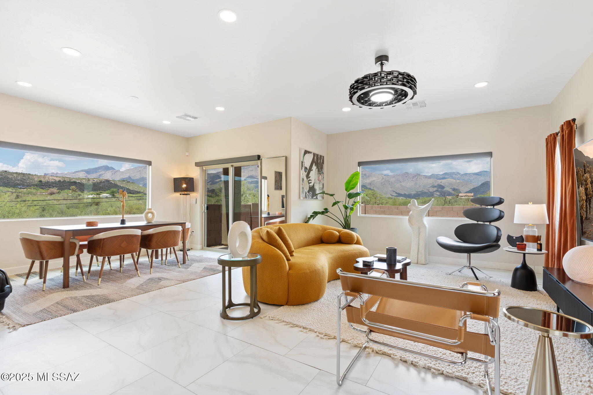 VIEWS VIEWS VIEWS! This stunning like new home offeres you luxury at all angles. Come home to breath taking views whether it be from your living room or from the balcony of your beautiful master bedroom! just minutes away from Sabino Canyon. This home sits in a small community of only 5 homes. Do not miss the opportunity to own this one of a kind home!