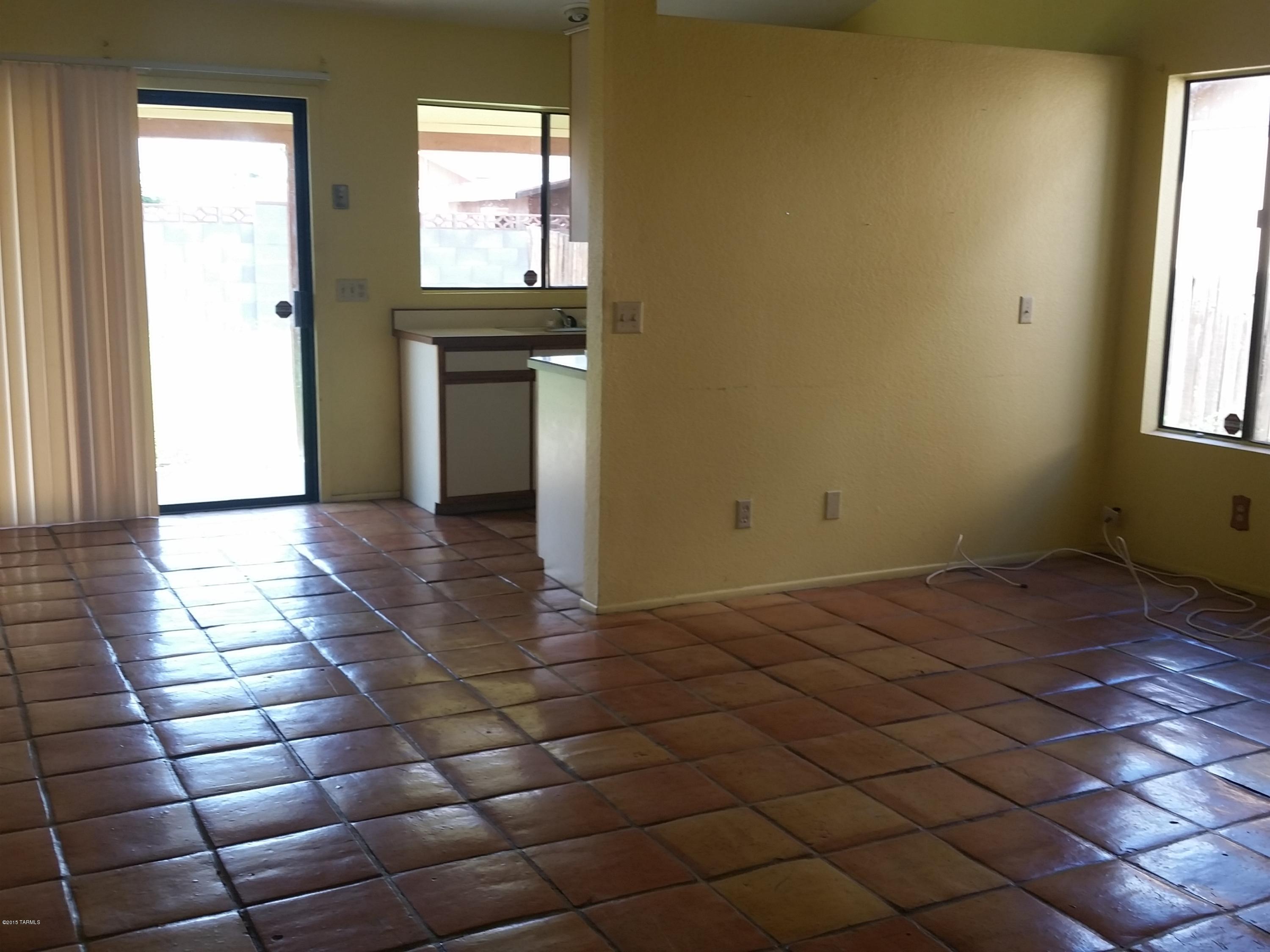Range Pricing: Seller will accept or counter offers between $70,000 - $75,000. Spacious home with large kitchen that opens to family room with fire place. Saltillo Tile... A block to the park and community pool. Peaceful home. Close to I-10 & shopping centers.