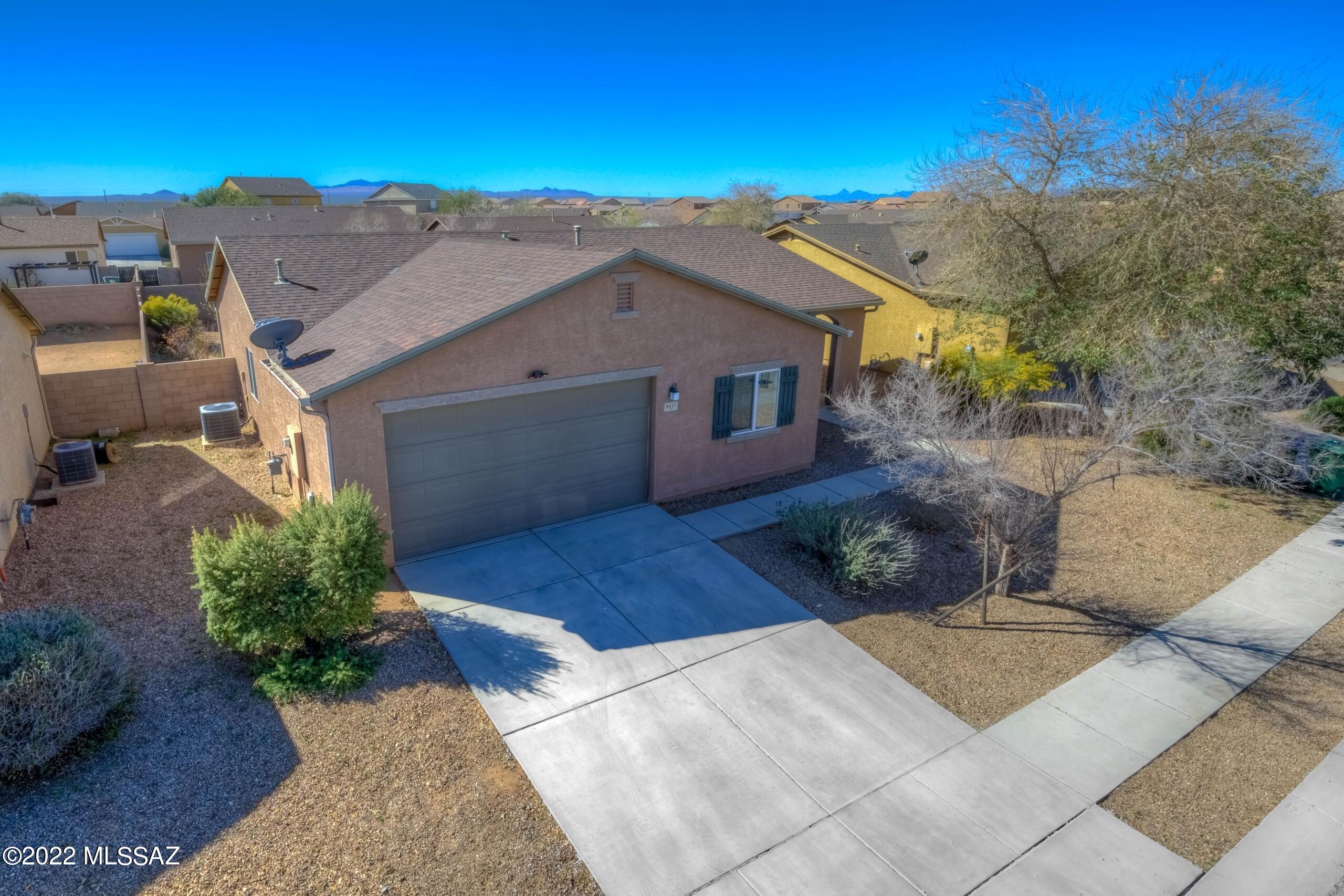 Single story beauty in Sonora Ranch with 4 Bedrooms and 2 Baths. Features open floor plan of 1,558 sf, surround sound, kitchen backsplash, black appliances, 2-car garage and large fenced backyard. BRAND NEW vinyl wood plank floors, carpet, and paint throughout. Fridge, washer, and dryer stay. Located in Sonora Ranch just a block from new park and minutes from shopping, restaurants, and Casino Del Sol.  Open House to be held Saturday and Sunday, March 12th and 13th from 12 noon until 4:00 pm. No showings before then. Message with any questions.