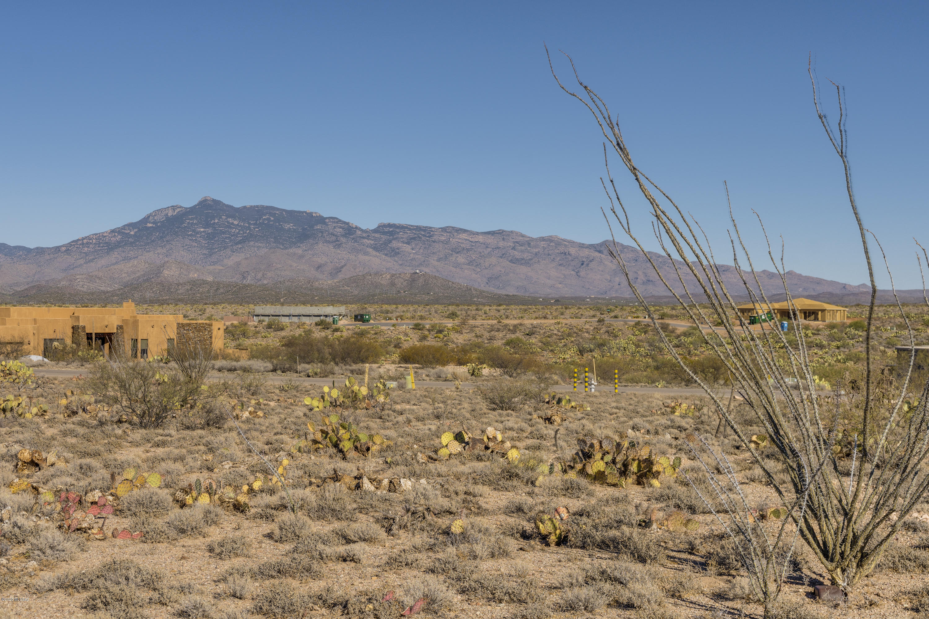 Surround your custom dream home with the spectacular Catalina and Rincon Mountain views from your quiet and peaceful lot located in the beautiful neighborhood of Windmill Ranch. Almost an acre of privacy, paved street and utilities to the property, plus easy access to I 10, Raytheon, shopping and dining. Located in the Award Winning Vail School District.