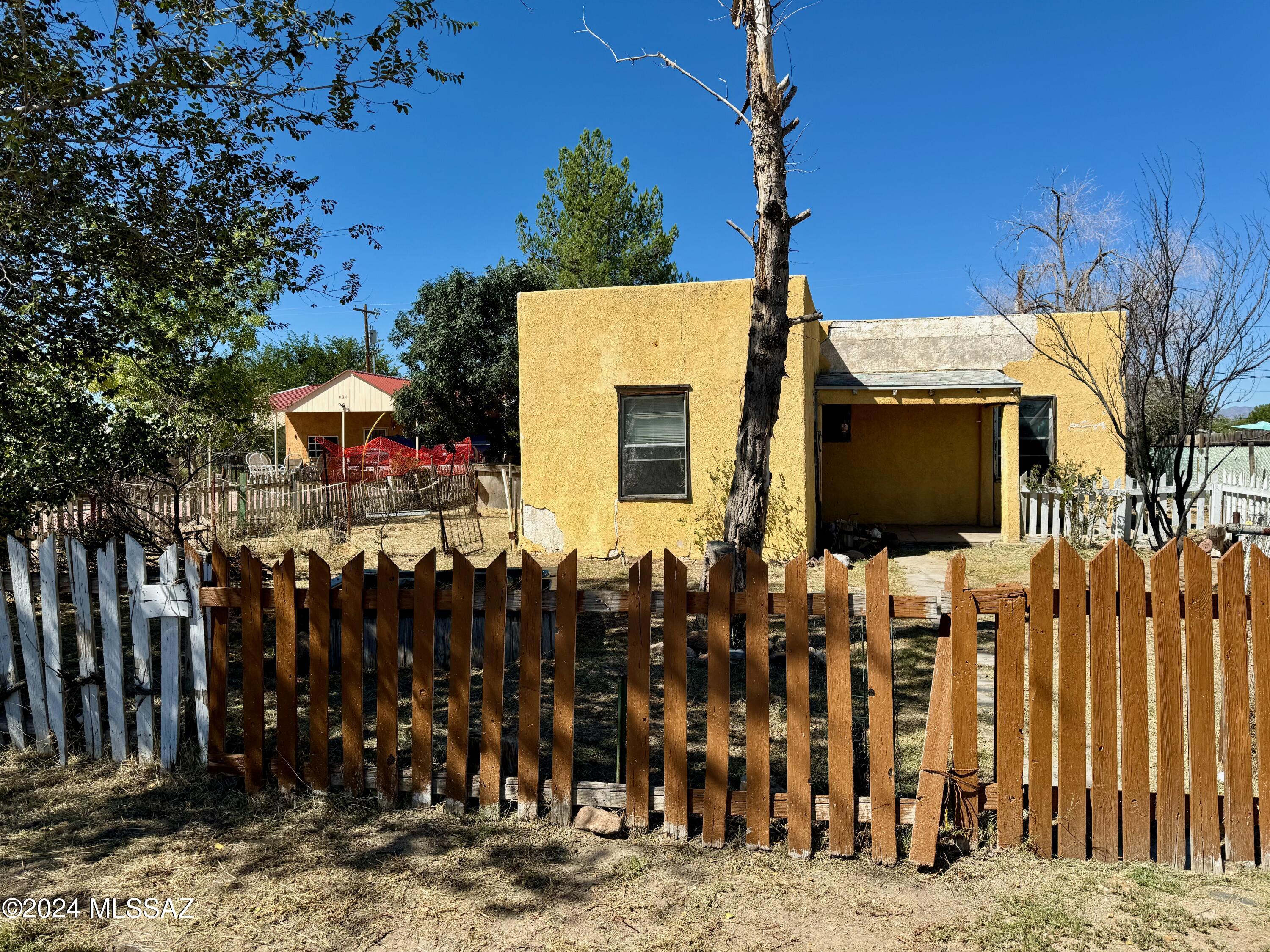 This is the cutest historic plan in Willcox AZ for this price. Calling all investors, flippers, or just plain ol' people looking for a phenomenal deal. The floorplan is a main living room, kitchen, Small dining area, 1 bathroom, another small den and a full bedroom. The yard is huge and has a workshop/ shed in it. Renovate this home to its former splendor and keep it as a rental or sell it! Close to schools and shopping! Sold AS IS/ Where is. Seller is providing a Special Warranty Deed. No Utilities will be turned on for inspections. LIMITED SPDS/ NO CLUE.