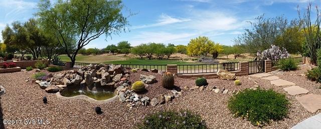 Bright, Light & Open Floor Plan: 2 Bedroom, 2 Bath home with Den on the Golf Course with Mountain & Sunset Views! Exterior was just painted (March 2017). Kitchen/Dining is Open to the Great Room. Tile in the Foyer, Kitchen, Baths & Hallways. Ceiling Fans in the Great Room, Den & Bedrooms. Kitchen has Reverse Osmosis, trash compactor & pull-outs in the Pantry Cabinet. Master Bedroom has a walk-in closet & a slider to the patio. The backyard overlooks hole #1 on the Quail Golf Course. There is a soothing water fall, fire pit, gas stub for the BBQ & also your very own lemon tree! Garage is EXTENDED 4 ft. & has built-in Cabinets & Workbench. It is a short walk to all the amenities that Quail Creek has to offer. Enjoy the Quail Creek lifestyle for a fraction of the cost to build new!