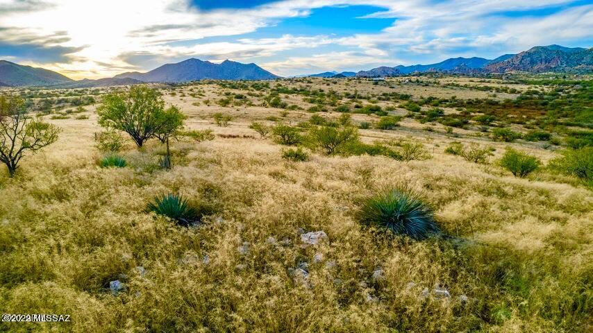 Gorgeous 18 plus acres located in the town of Dragoon in Texas Canyon Ranch. Stunning 360 degree views are incomparable! Right off the
I-10 and Dragoon road, you are minutes away from the highway and amenitites, yet feel like you are worlds away with all the privacy you need. Partailly fenced,
with water and power close, this property is the perfect place you have been looking for to build your site built home, manufactured home or RV. Tons of room
for your horses, other animals and toys in the year round temperate climate of Dragoon in Cochise County. So many activities available and nearby places to
explore.... this is your dream property!

Seller financing available as well as conventional lenders. Call Agents.