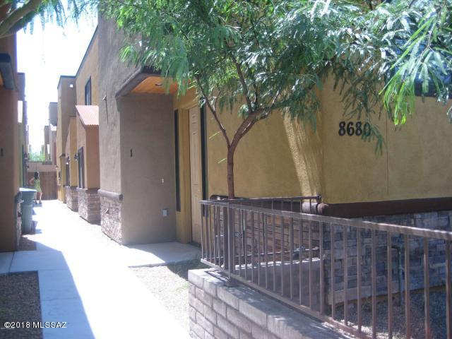Charming two story, 3 bedroom, 3 bathroom townhouse on the eastside includes a 2 car garage and a single carport space.  Close to Davis Monthan, Raytheon, and lots of shopping.  SEWER, TRASH, AND WATER ARE INCLUDED IN THE RENT.  ANY WATER BILL OVER $100 SHALL BE BILLED TO THE TENANT.