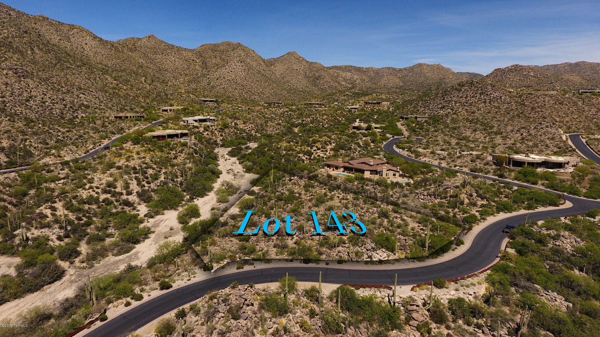 A Spectacular Canyon setting with the homesite sitting on the edge of a large open space preserve! Rock outcroppings define the north line and create a dramatic effect for the perfect custom home! Sweeping view straight down the Canyon with the mountains framing either side of this beautiful vista! Watch the star studded Arizona sky at night with not a street light in sight to hamper those constallations! Fully guard gated community & loads of privacy! Enjoy 5 restaurants on Dove Mountain including the Ritz Carlton!  Golf club membership available at the Gallery! One of Tucson's favorite courses.