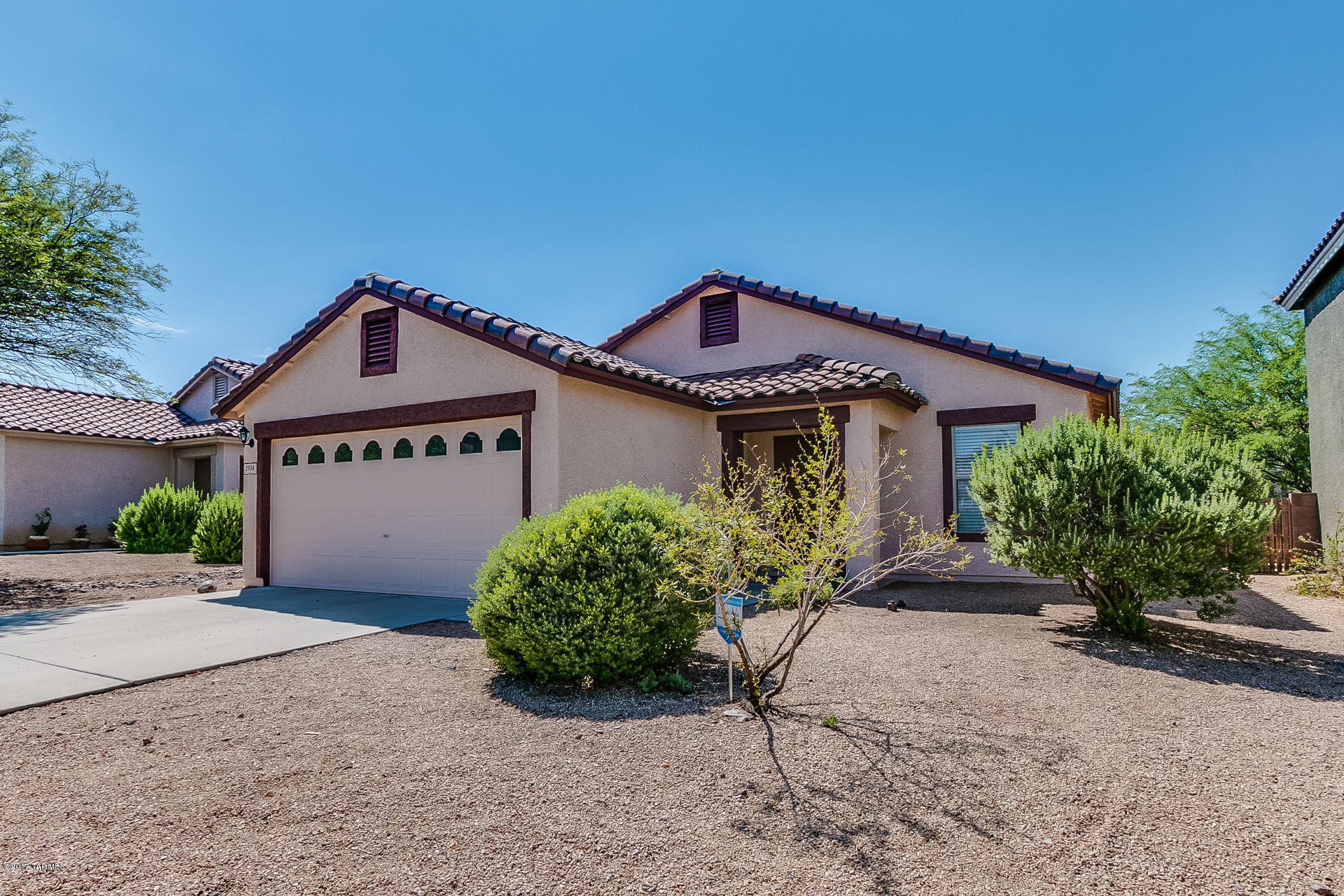 JUST REDUCED! Awesome Location. Minutes from Downtown. Highly desirable west side Sweetwater Reserve home with beautiful upgrades. New granite kitchen and bathroom counters and sinks. Granite kitchen island with breakfast bar. Stainless steel appliances with new
refrigerator. Newer blinds throughout. New thermostat. Easy-care 18'' neutral tile floor throughout home. Bright and sunny. Newly-painted interior
and exterior. Front and backyard irrigation. Walking Paths plus relax at the community pool and spa. Completely ready to move-in and enjoy.