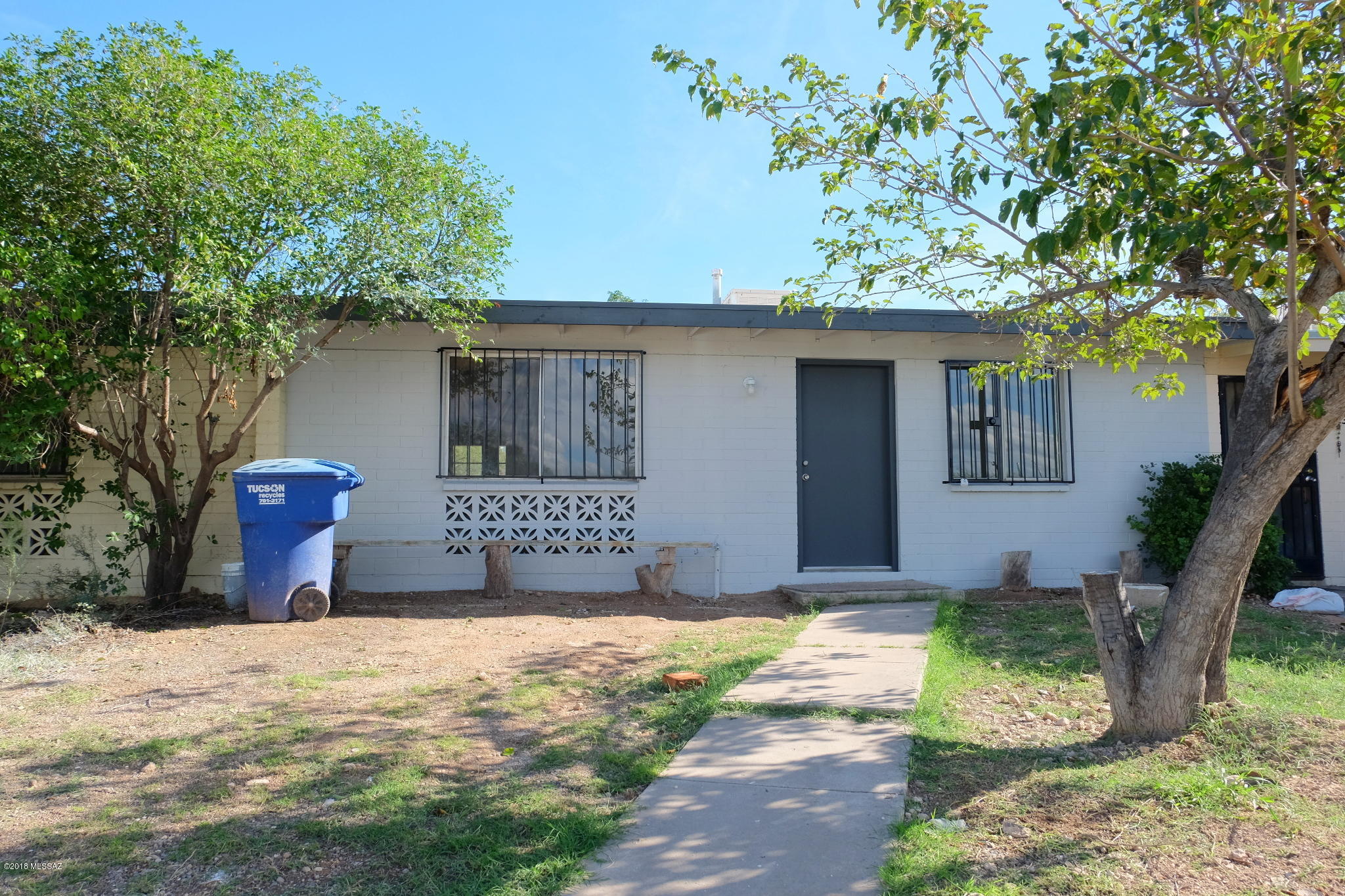 Enjoy the great location of this 2 Bedroom/1Bath completely remodeled unit close to several area parks, schools, Kino Sports Complex/YMCA, and Banner Medical Center on the Southern side of Tucson. Woodgrain tile flooring throughout the living areas and kitchen, new carpet, new cabinetry/countertops, and kitchen appliances are all ready for you to move right in. Larger fenced backyard is backed by the privacy of the Sam Lena Recreation Area. 1yr minimum Lease, $35/adult Application Fee, $725 Security Deposit, $150/pet Pet Fee with approved pet, $100 cleaning fee. Tenant pays all utilities. Available immediately. Text 520-250-8986 for more info and to schedule a showing.