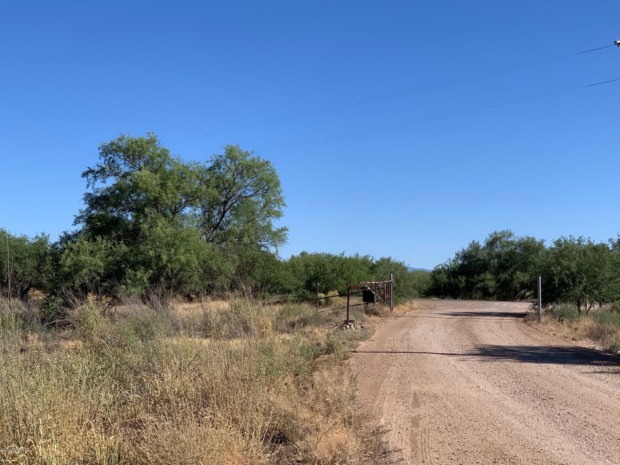 2 buildable lots for a total of 3.47 acres located at the entrance to a small development of custom built homes in Pomerene with frontage on paved Pomerene Rd. and Alvie Lee Lane. No H.O.A.  Enjoy country living and mountain views yet only minutes from I-10 and Benson for easy commute, shopping, medical and restaurants.  No Manufactured Homes allowed. Water, electric and phone are available.