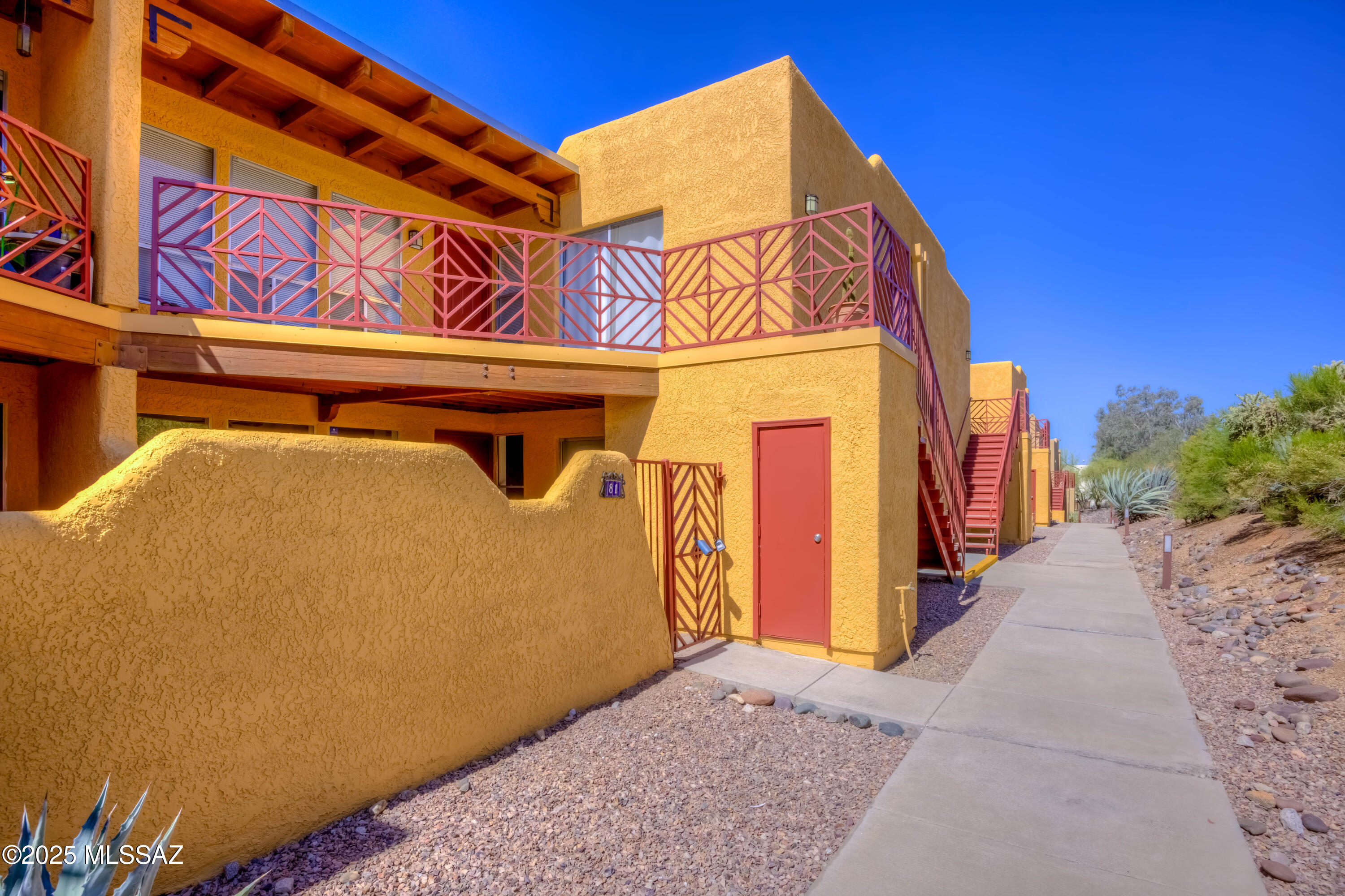 Enjoy low-maintenance desert living in this charming 2-bedroom, 1-bathroom ground-floor condo located in the desirable Reflections in the Catalinas community. With 969 sq ft of comfortable living space, this unit features fresh interior paint, new carpet in the bedrooms, and unbeatable desert views right outside your front door. The open layout offers a bright living area and a functional kitchen, while the primary bedroom opens directly to a private front patio—perfect for relaxing or entertaining. The patio area features pavers and artificial turf, blending comfort with low upkeep. Other highlights include in-unit washer and dryer and access to community amenities including a pool, spa, and workout facility. The seller is offering 6 months of HOA credit with accepted offer. balance of nature and convenience. HOA dues include water, trash, and sewer, making this an ideal primary residence, winter retreat, or investment property.