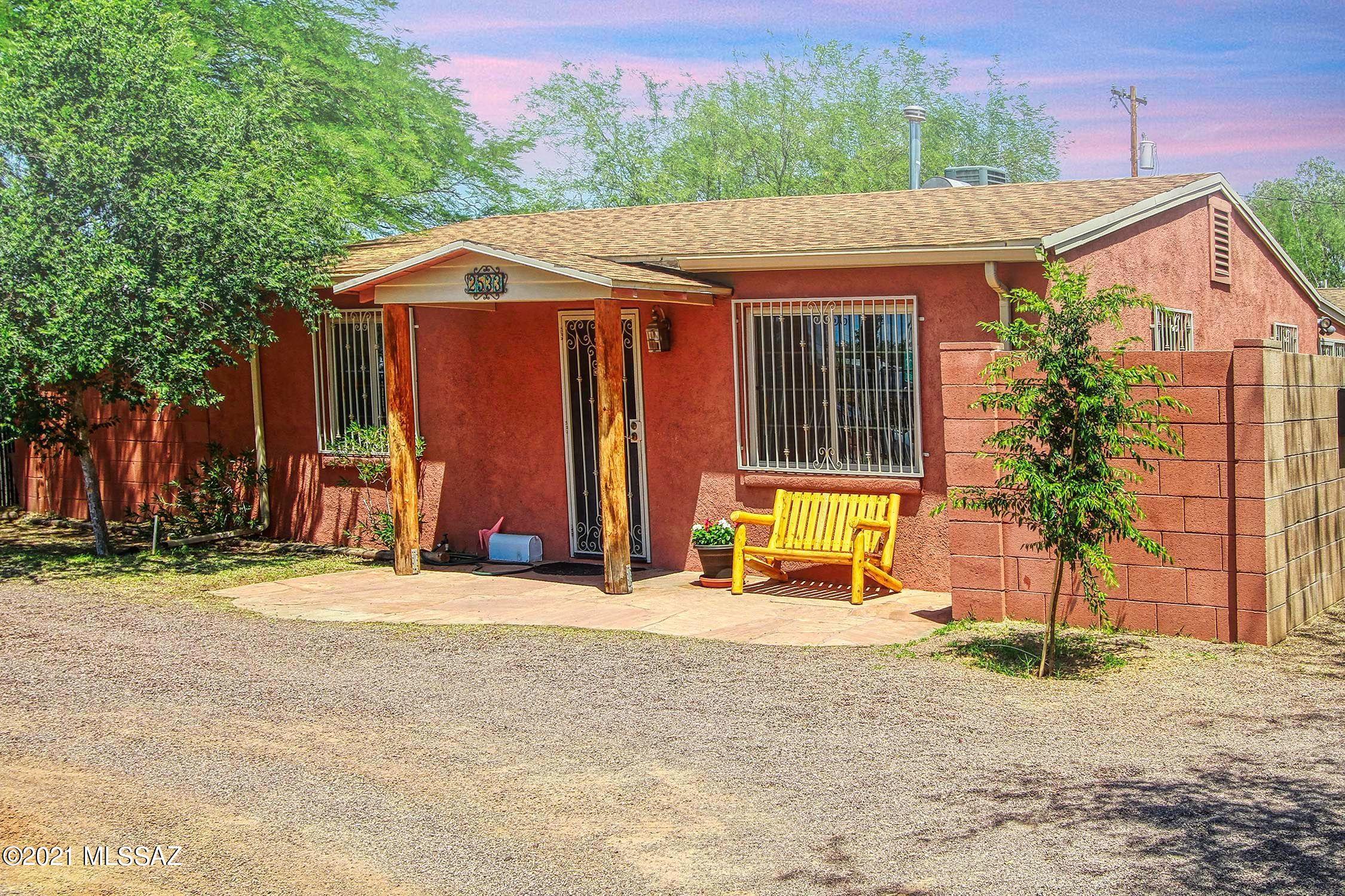 It is all about the Location!!  Charming Central Bungalow!  Right on the bus line and convenient to U of A and TMC.   Perfect for students, Grad Students, health care workers  or anyone that wants to be in the heart of Central Tucson.  Updated and ready to go!  Updated kitchen includes granite and soft-close cabinets.  Ceramic tile throughout.  2 large bedrooms and an enjoyable family room with recessed lighting and soothing paint colors provide a pleasant homey feel.   Permitted 100 plus sf addition adds indoor laundry with laundry sink, dining area/office or other extra space.    Delightful backyard with brick pavers and turf.   Don't miss it!!
