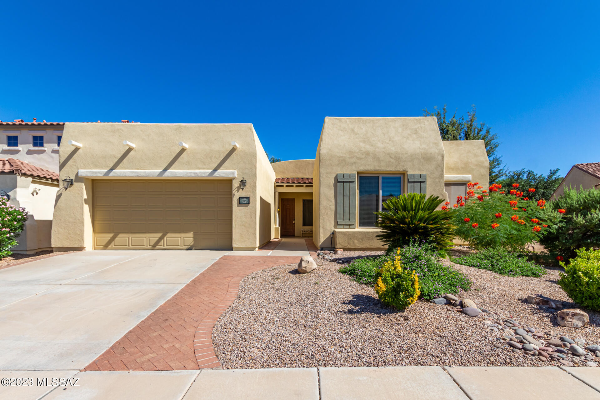 Welcome to this beautiful 3-bed, 2-bath home in Presidio Del Valle! Offering a lovely landscape, & inviting front porch are just the beginning. Discover a formal dining room and an open-concept kitchen & living area w/fireplace! Designer palette, archways, natural light, and tasteful flooring - tile & wood throughout. The kitchen boasts SS appliances, recessed & pendant lighting, staggered cabinetry, 2-tiered island, and a breakfast area. Main bedroom has private access to the backyard and an ensuite with a separate tub & shower and walk-in closet. Bonus den and an office area! Enjoy relaxing or entertaining guests in the backyard offering a covered patio, and built-in BBQ.
