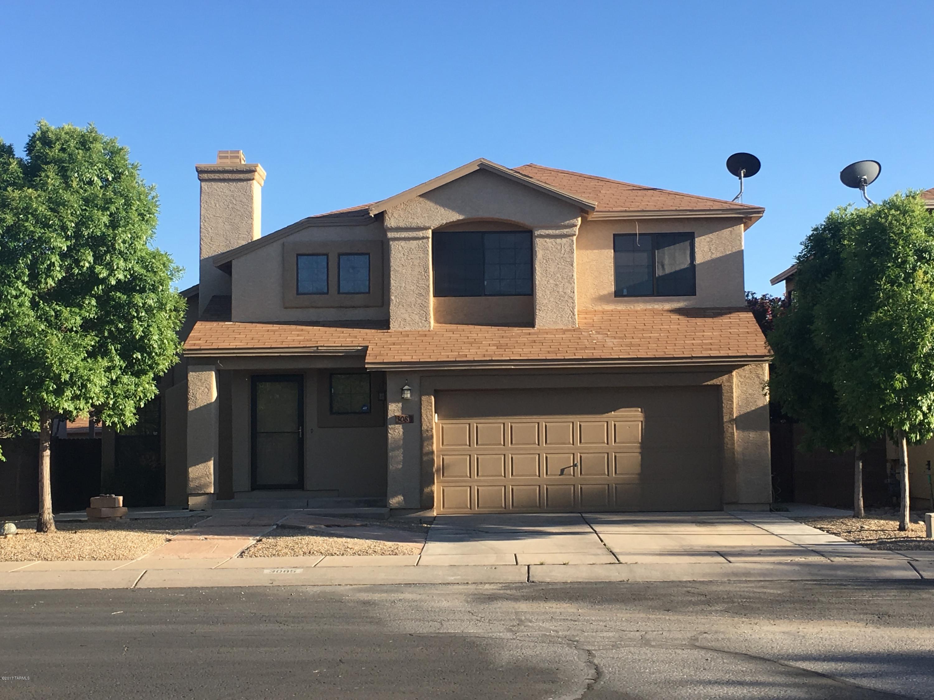 Private home on cul-de-sac in desirable Country Club neighborhood across from Omni Tucson National. 5/8” Bamboo flooring throughout with ceramic tile in bathrooms, custom flagstone fireplace with warm, neutral paint tones and “distressed” look cabinetry complete with sliding barn doors & chalkboard pantry door. Relax and enjoy lush backyard with covered patio, custom gas firepit, extended flagstone patio, brick cobblestone pavers, and mature trees on irrigation providing shade & privacy. One-year home warranty included!