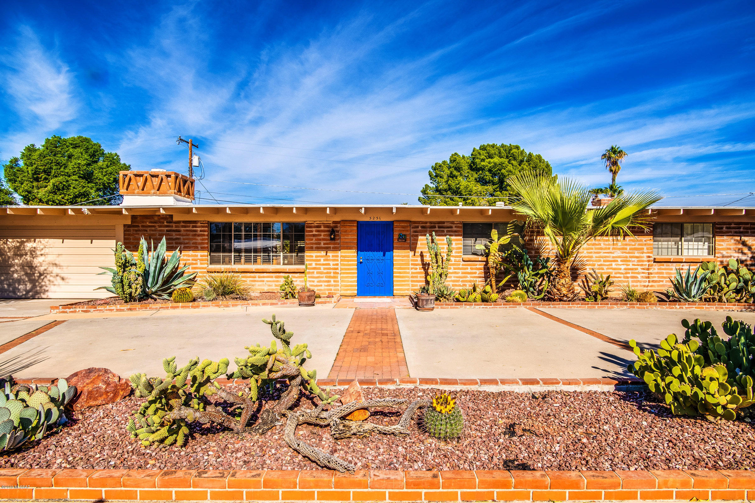 This spectacular move-in ready home is centrally located in Darling Acres and features a circular driveway with amazing curb appeal leading up to a 2 car garage! Inside, this beauty boasts an exposed brick living room with wood burning fireplace, open kitchen with granite counter-tops, stainless steel appliances including a wine fridge, new cabinets, pendant lighting, and ceramic wood style flooring, enclosed Arizona room encompassed with natural light, master suite with walk-in closet, fireplace, and freshly updated master bathroom including a huge shower! In the backyard lies a desert oasis featuring a stone column gazebo with ceiling fan and lighting, a sparkling pool, outside storage,  and an extended height fence. This home is truly one of a kind, a must see!
Seller is having roof coated.