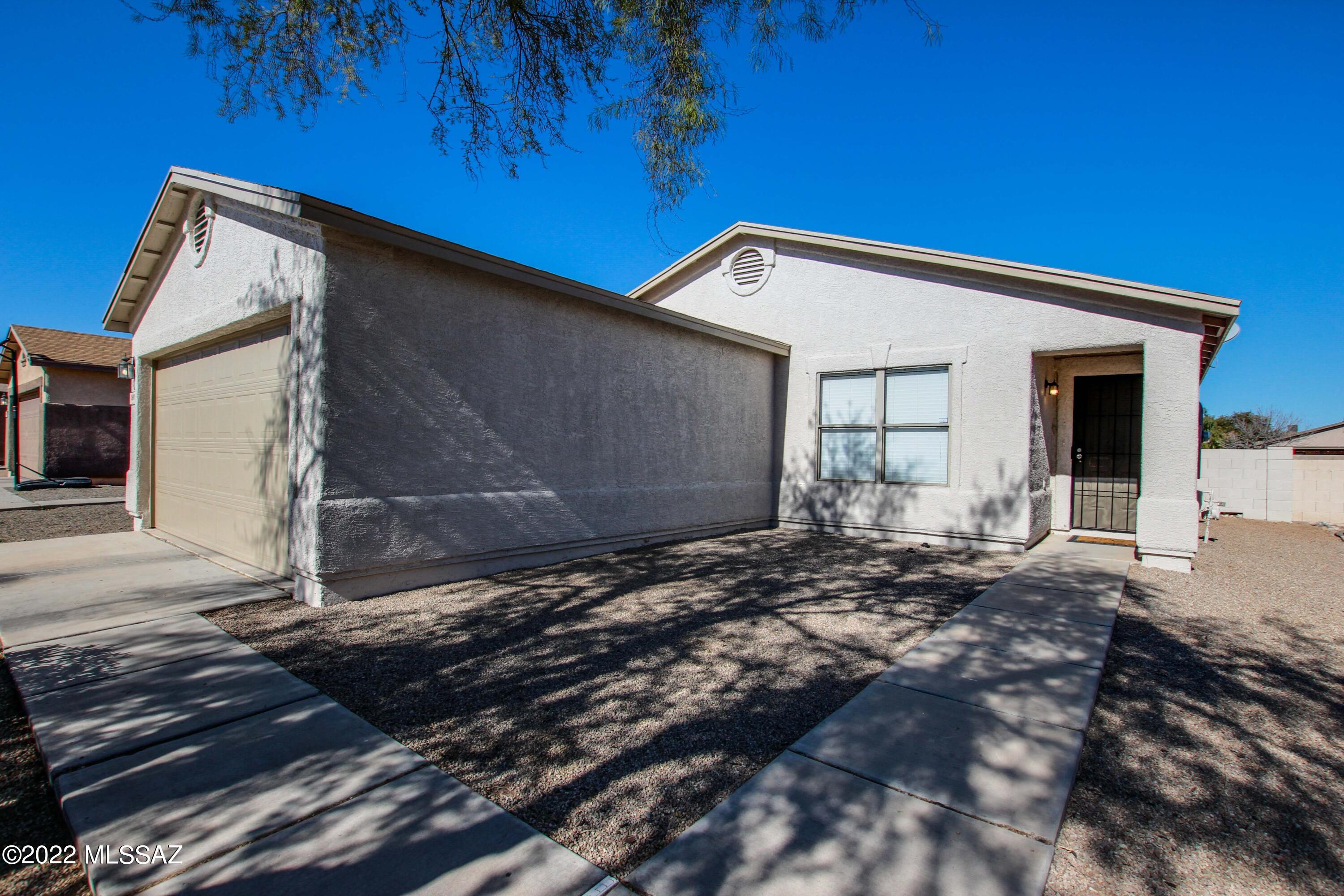 Modern and clean single level home! 3 Bedrooms + Office/4th Bedroom + 2 Bathrooms. Fantastic open floorplan. Modern tile, carpet, paint (in/out), cabinetry (quality w/ soft close + plywood boxes), slab granite counters, undermount stainless sink,
stainless Whirlpool appliances, gas range, updated lighting, satin door hardware, dual
flush toilets, updated bathrooms, wood blinds, garage door opener, landscape rock and more. Plus owned 32 solar panels (no contract).
