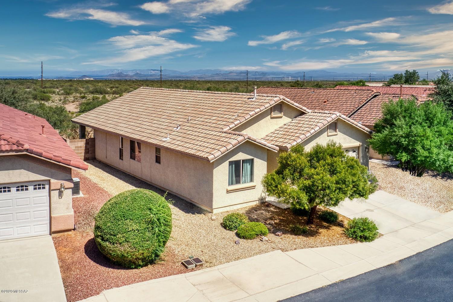 This beautiful, 4 bedroom, 2 bathroom home is located in the well maintained and much sought-after Holiday subdivision. This home offers a nice kitchen that opens into the Livingroom and eating area, as well as a split plan for bedrooms. There is a low maintenance yard within a block fence that backs up to the jogging path and wash - No buildings behind to obstruct views. This community offers a community center with billiard area, a large event/ball room, exercise facilities, two picnic/BBQ and playground areas, THREE pools, and a heated spa. Priced to sell!