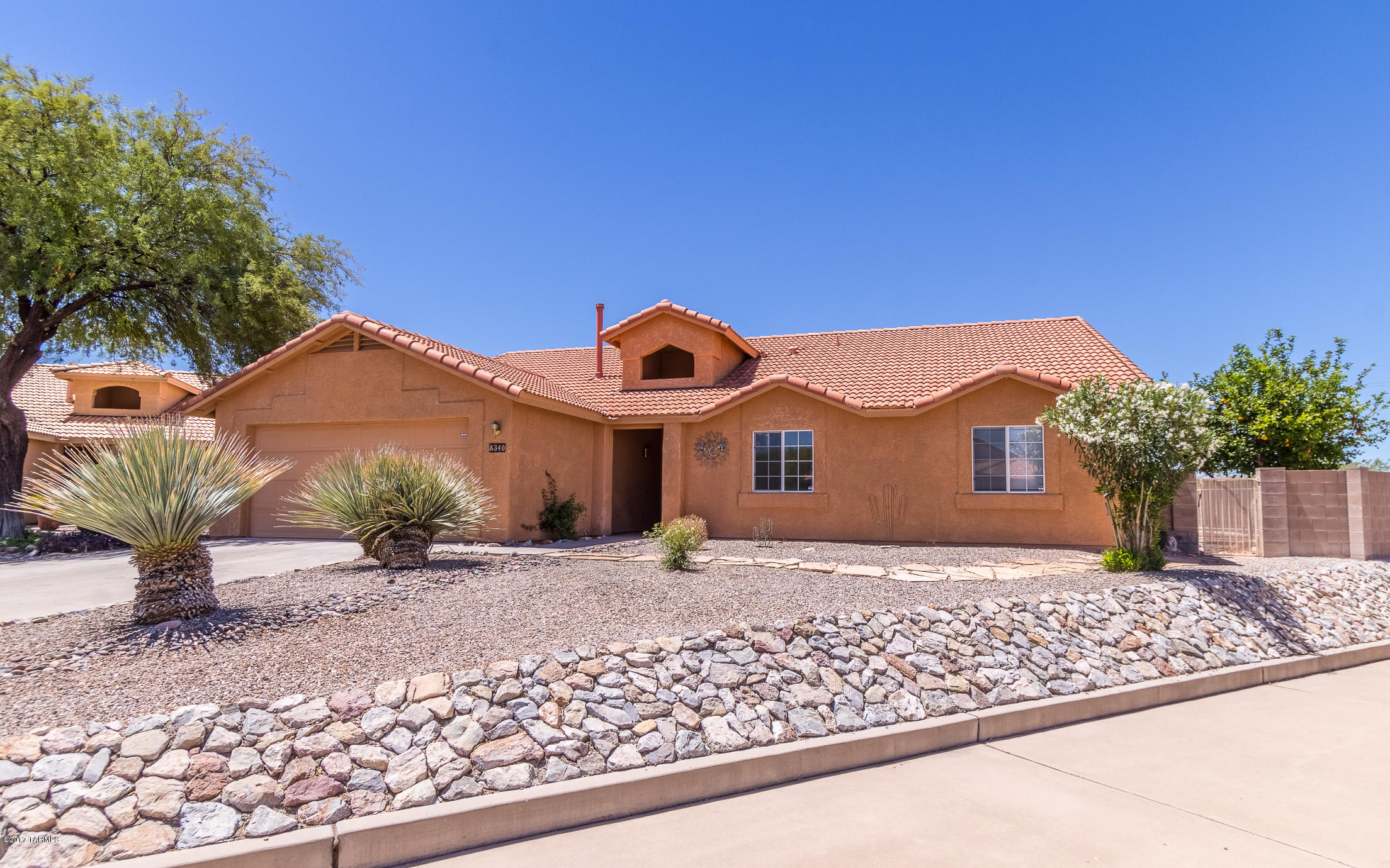 Impressive 4 bedroom in sought after, award winning Vail School District. Quality built by US homes/Lennar. Generous Great Room floor plan with separate family room and formal dining area all enhanced by vaulted ceilings for a spacious feel. Tucked away on a private lot backing up to wash on the side and the back. The kitchen features granite counter tops, brand new RO filter, brand new microwave, and lovely tile work for decoration. The master suite includes double sinks, walk-in closet and a jetted spa tub. And the cherry on top is the newer, high efficiency A/C, saving you a bunch of money on electric bills. Life is to enjoy in this home be it in front of the gorgeous gas fireplace in winter time or at the sparkling pool with its water feature the rest of the year. OUTSTANDING VALUE!