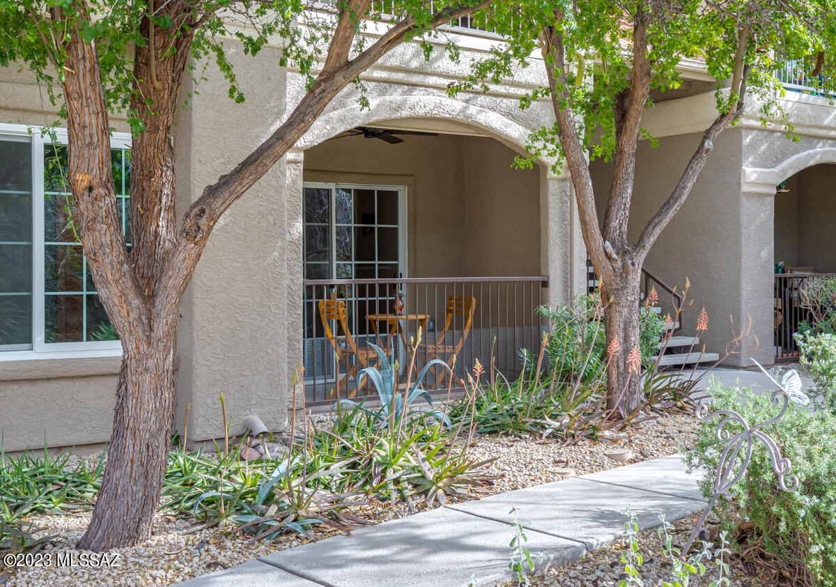 This nicely updated Condo is on the first floor and includes a beautiful patio overlooking natural desert surroundings. Interior upgrades include: newer hot water heater, recessed kitchen lighting, dimmers on all switches, tile flooring throughout, open kitchen w/ granite tile counters, and stainless-steel appliances. The bathroom includes tile counters, dual sinks & oval garden tub. The patio also has a retractable privacy shade/curtain. The Condo is conveniently located for shopping, biking and hiking. The amenities include a wonderful Recreation Center with heated pool, spa, fitness and business center...Resort style living at its best.