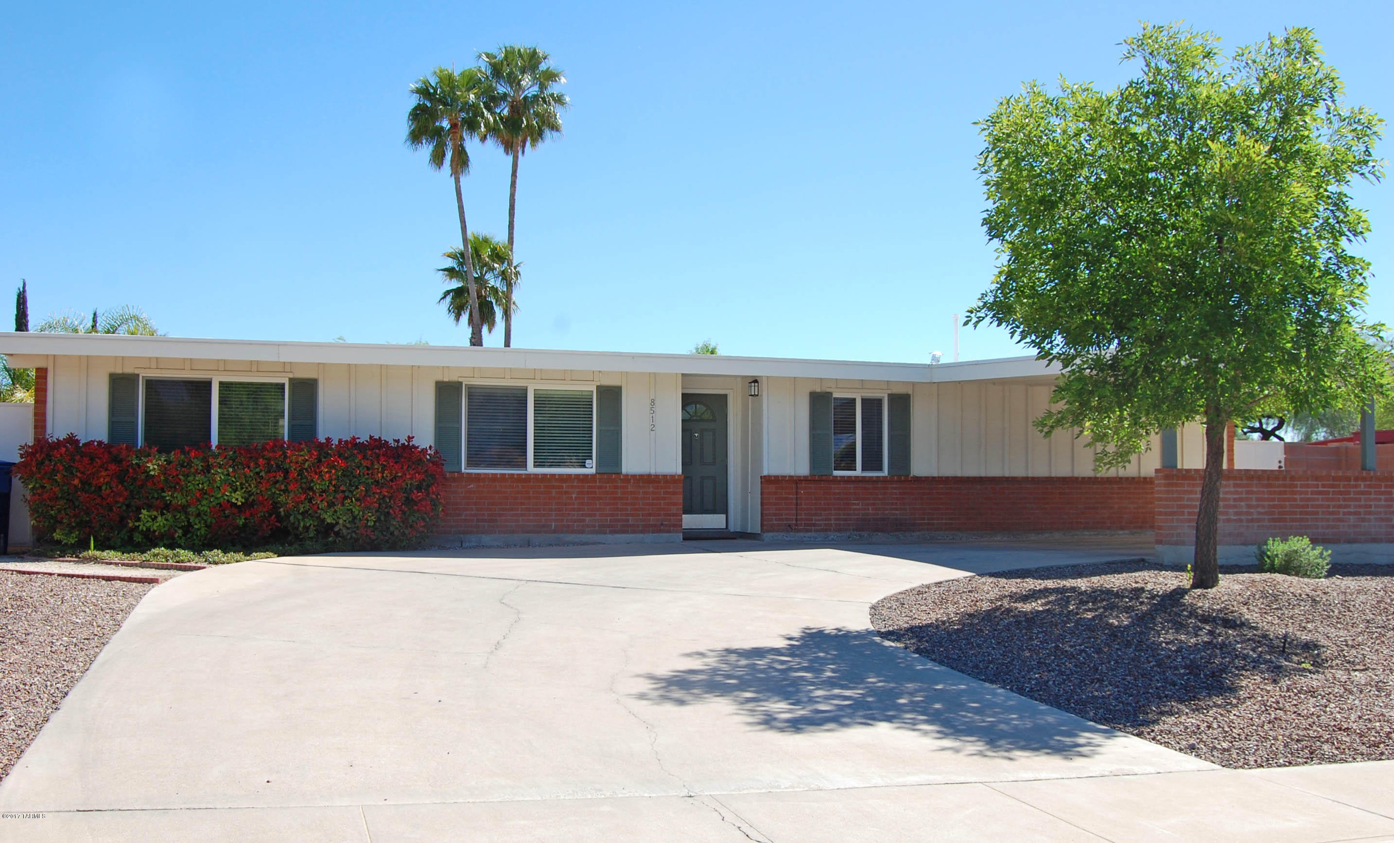 RANGE MARKETING-Seller accepts/counters offers $210,000-230,000. Shows like a MODEL! Lovely 3 bedroom, BRICK ranch home! Bright, cheerful open floorplan! NO POPCORN CEILINGS! You'll enjoy ceramic tile throughout, big bedrooms, surround sound in open living room, gas stub available for kitchen stove and outside barbecue and many upgrades! Special walled rear yard features a clean, clear, COLD Pebble Tech pool and a full length patio . Extra attractions include white reflective roof, mountain views and plenty of parking and storage. Children can walk to Bloom Elementary. APPLIANCES negotiable. Much more!