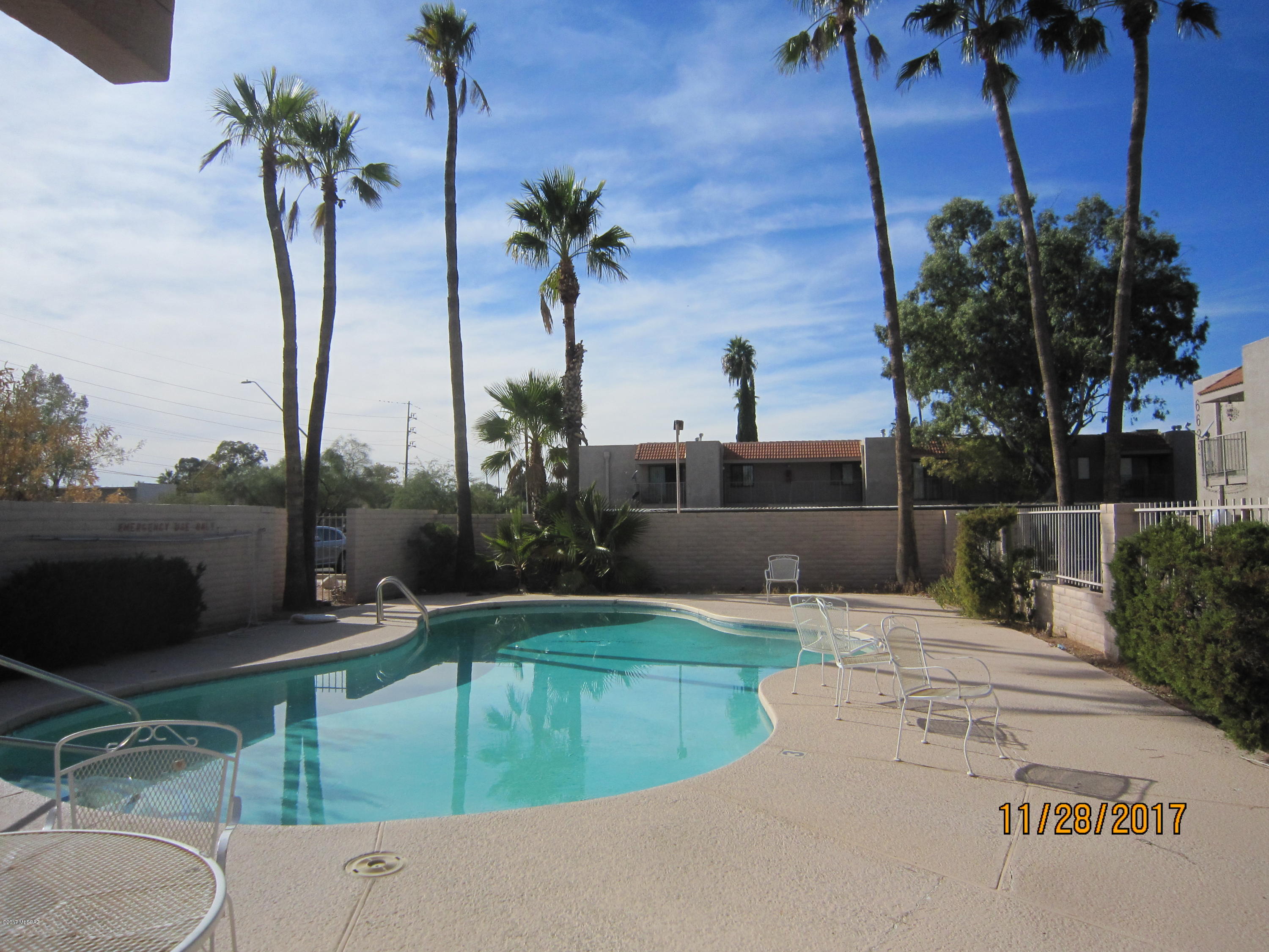New Carpet & Tile, Fresh Paint, New counter-tops and New Stove in this 2 BR, 2 BA Condo! Ground Floor Unit with Private Patio, Split Plan features Central A/C, Ceiling Fans, Walk-in Closets, Gas Furnace + Community Pool & Covered Parking! Close to all Conveniences, Shopping, Restaurants & DMAFB!