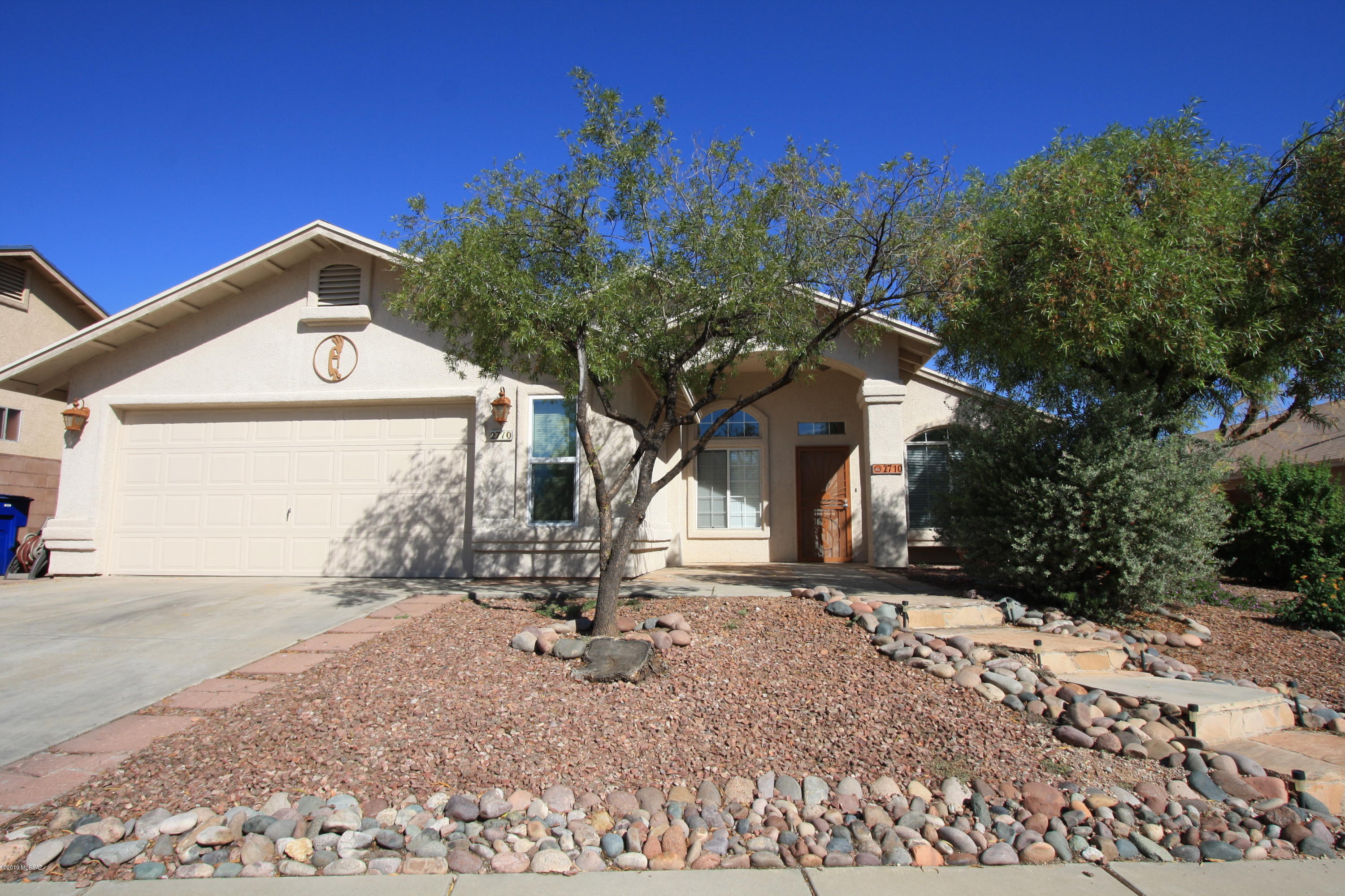Fabulous 3bdr/2ba w/Den in West Tucson!
Beautiful new tile throughout. Formal Living/Dining Room, Spacious Family Room, Kitchen w/Counter Seating, Island, Stainless Steel Appliances and Casual Dining Nook.
Large Den off Living Room has extra Closet space!
Master Bedroom has Huge walk in closet and Master bath offers Dual Vanities, Garden Tub and Separate Shower.
Awesome Backyard w/Mountain Views, extended covered patio and enjoy BBQ's on your private Gazebo.
Need extra garage space oversized 2 car garage offers  that extra storage with work bench.