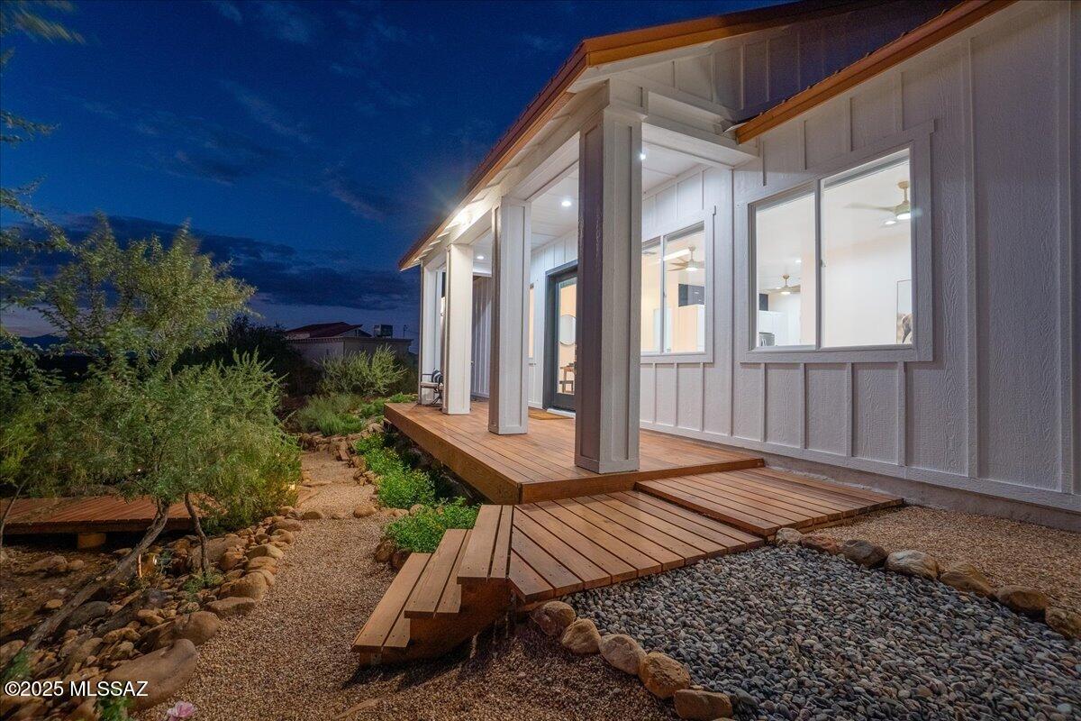 Luxury Hilltop Retreat with Panoramic Mountain Views!
Perched atop a scenic hill with breathtaking views, this custom-built 4-bedroom, 2-bathroom residence blends modern elegance with serene natural beauty. Designed for both comfort and sophistication, the home features a thoughtfully crafted split-bedroom floor plan and soaring 10' ceilings throughout. Step into the oversized 18x16 primary suite, complete with a cozy electric fireplace and a luxurious 12x9 walk-in closet. The spa-inspired en-suite bath boasts dual vanities, dual shower heads, and a heated jetted soaking tub-perfect for unwinding after a long day. Enjoy striking panoramic views through large picture windows outfitted with blackout shades for ultimate privacy. The entire home is finished in exquisite 24 x 24 Everest White porcelain flooring, offering a seamless and refined aesthetic. The thoughtful design of this home can be seen in so many ways, to include full spray foam insulation of all exterior walls, attic, garage, and garage door! Relax on the inviting cedar slat front porch, accompanied by the soothing sounds of a tranquil babbling brook water feature - your own private sanctuary just steps from the front door. This one-of-a-kind home offers the rare combination of upscale finishes, thoughtful design, and stunning natural surroundings. Come experience elevated living like never before!
