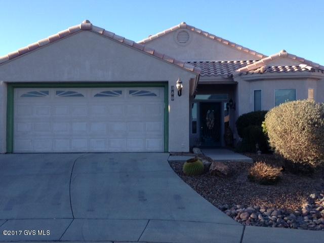 Lovely 2 bedroom 2 bath in a culdesac in the gated community of Sunrise Pointe Vistas. This open floor plan is great for entertaining. Large master bedroom with a large walk in closet. Master bedroom also has access to the rear patio. Guest bedroom is a nice sized room with mountain views. Kitchen is loaded with cabinets, granite and beautiful tiled back splash. Large living room with built ins and a fireplace and a den right off the kitchen. Mountain views from the back and side yard. A truly must see.