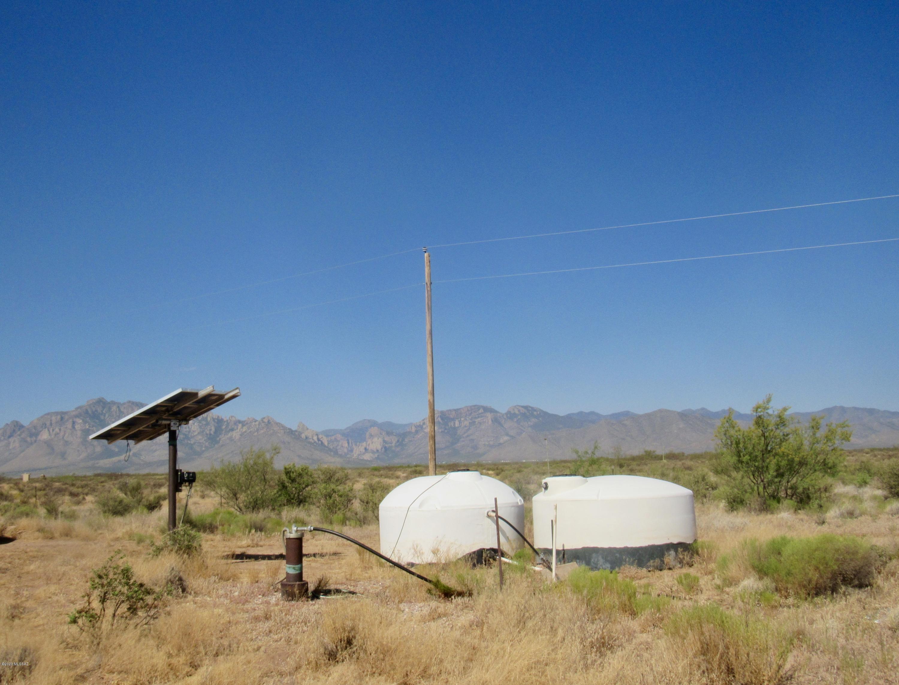 20 private acres with solar well, 2 water storage tanks, power at lot line & completely fenced Build a winter get away or your forever home. Chiricahua & Peloncillo Mtns surround the parcel creating breath taking views in all directions. BLM borders the parcel on the Northside. Wonderful sandy soil for successful gardening. Area is a favorite with astronomers for its famous clear dark skies. Cave Creek Canyon located in the Chiricahua's is a world class birding destination. There are abundant hiking trails just a few minutes drive or ride horseback over to the Forest. Community offers several cafes, post offices, library, churches, galleries, small grocery and medical clinic. Major shopping/medical are 50 miles south in Douglas, AZ or 90 miles to Silver City, NM.