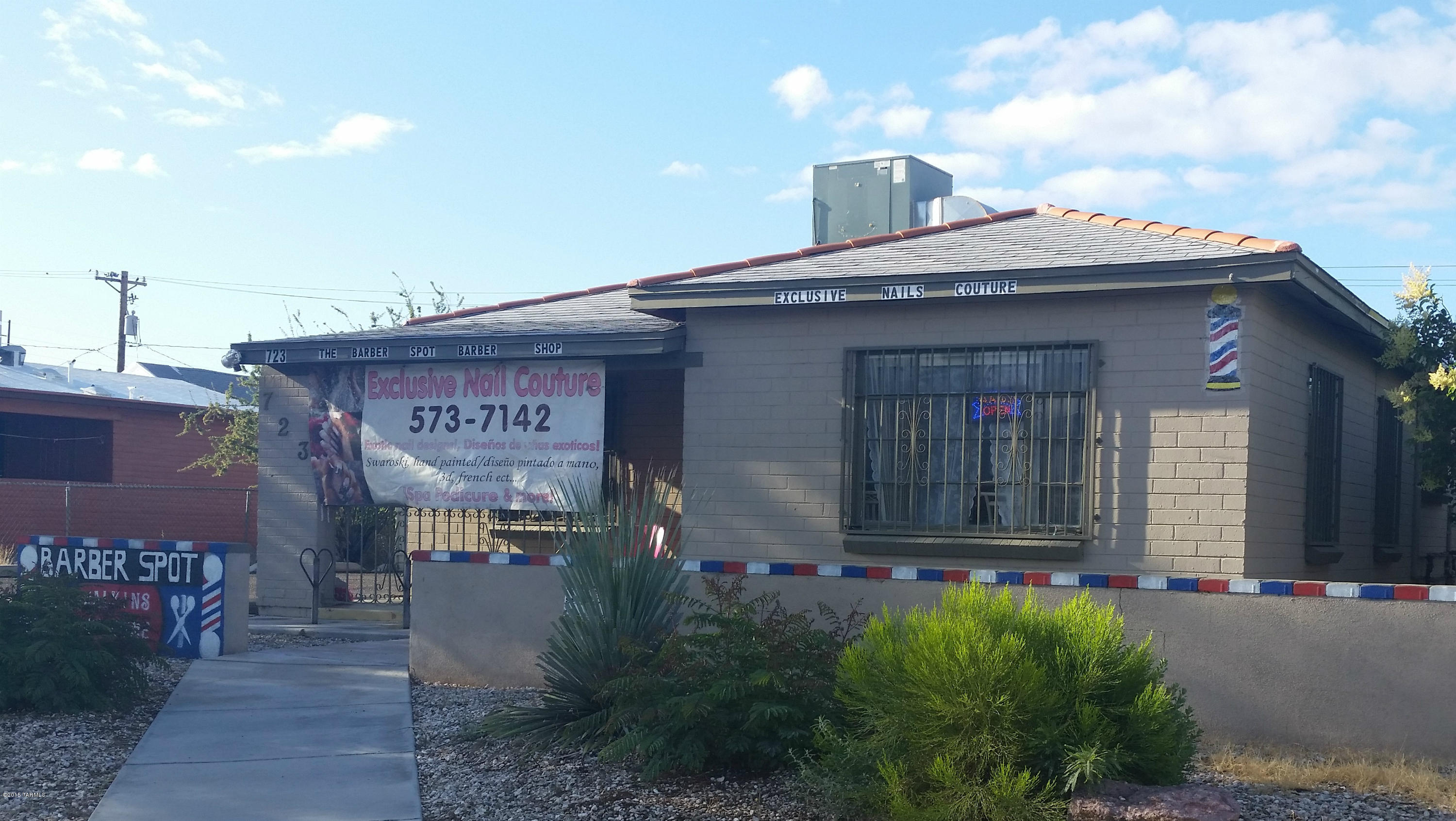 Great investment property.  Beauty salon is current tenant.  Do not go on property without agent.