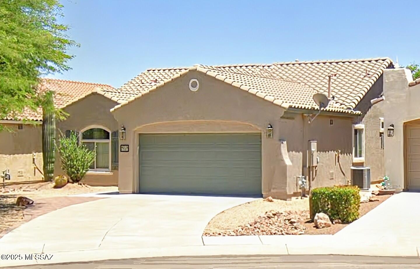 Welcome to carefree living! This immaculate home is nestled in the desirable 55+ Del Webb community of Rancho Sahuarita. Enjoy resort-style amenities at the state-of-the-art clubhouses. This beautiful home features a sought-after split bedroom layout, with 3 bedrooms and 2 baths. The kitchen opens to the living room, dining area, and is perfect for entertaining guests. Enjoy the backyard, offering a personal putting green, fruit trees, and low-maintenance desert landscaping. Situated on a cul-de-sac lot, with mountain views from the front.